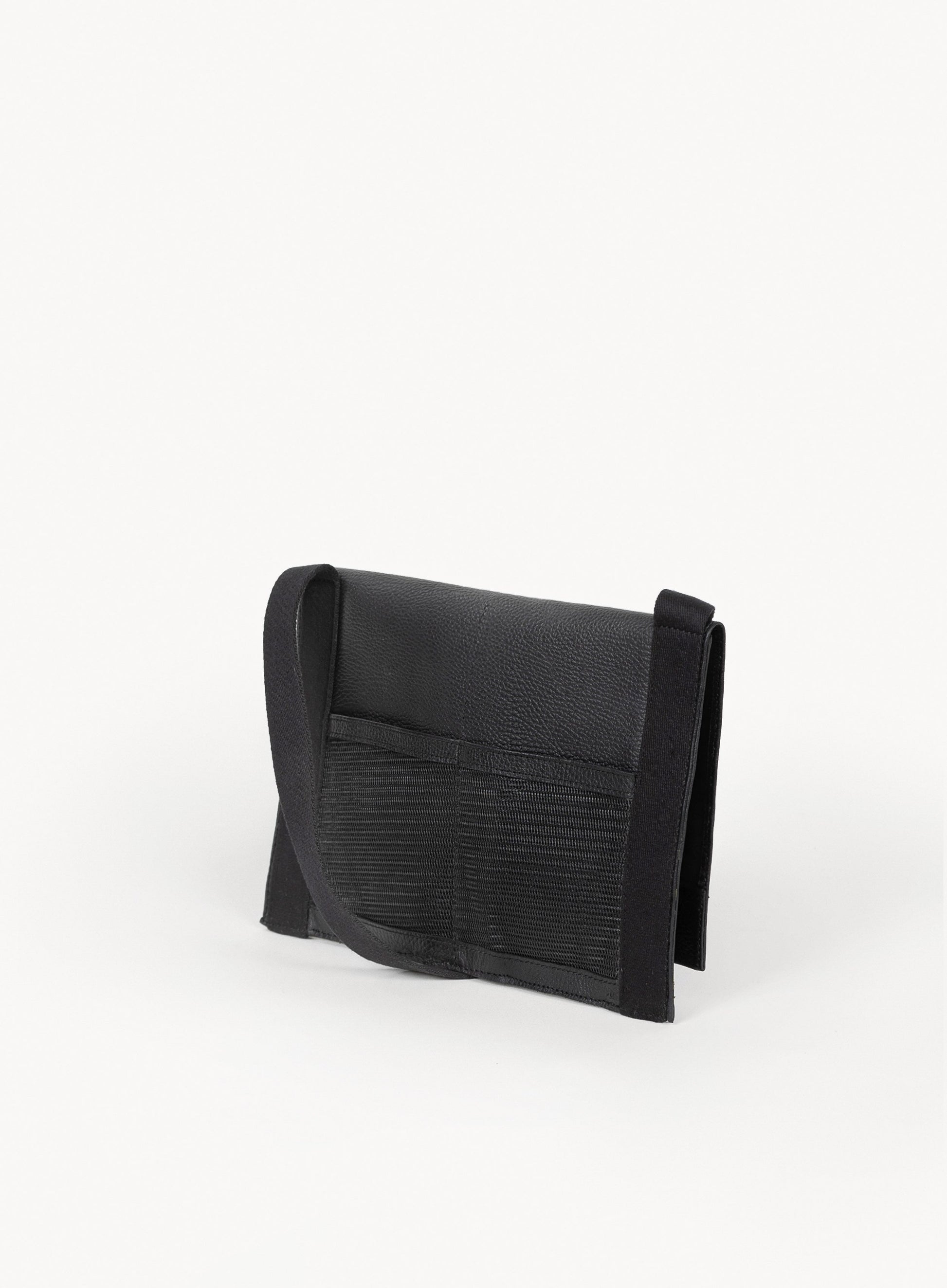 immediate action claymore bag in black showcasing the back side-view.