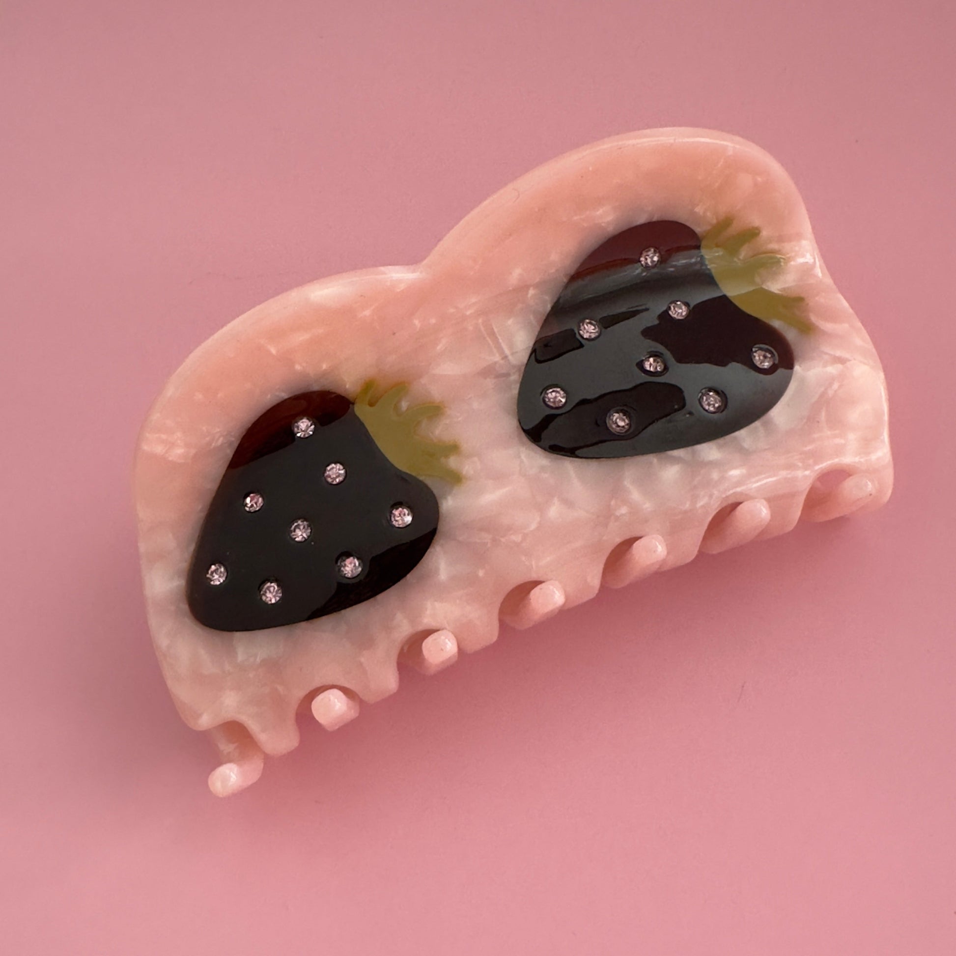 Centinelle Best Seller Strawberries Hair Claw. Handmade on cellulose acetate, with splice technique, exquisite miniature details and crystals, that are tied directly to its value and make them unique and special. 