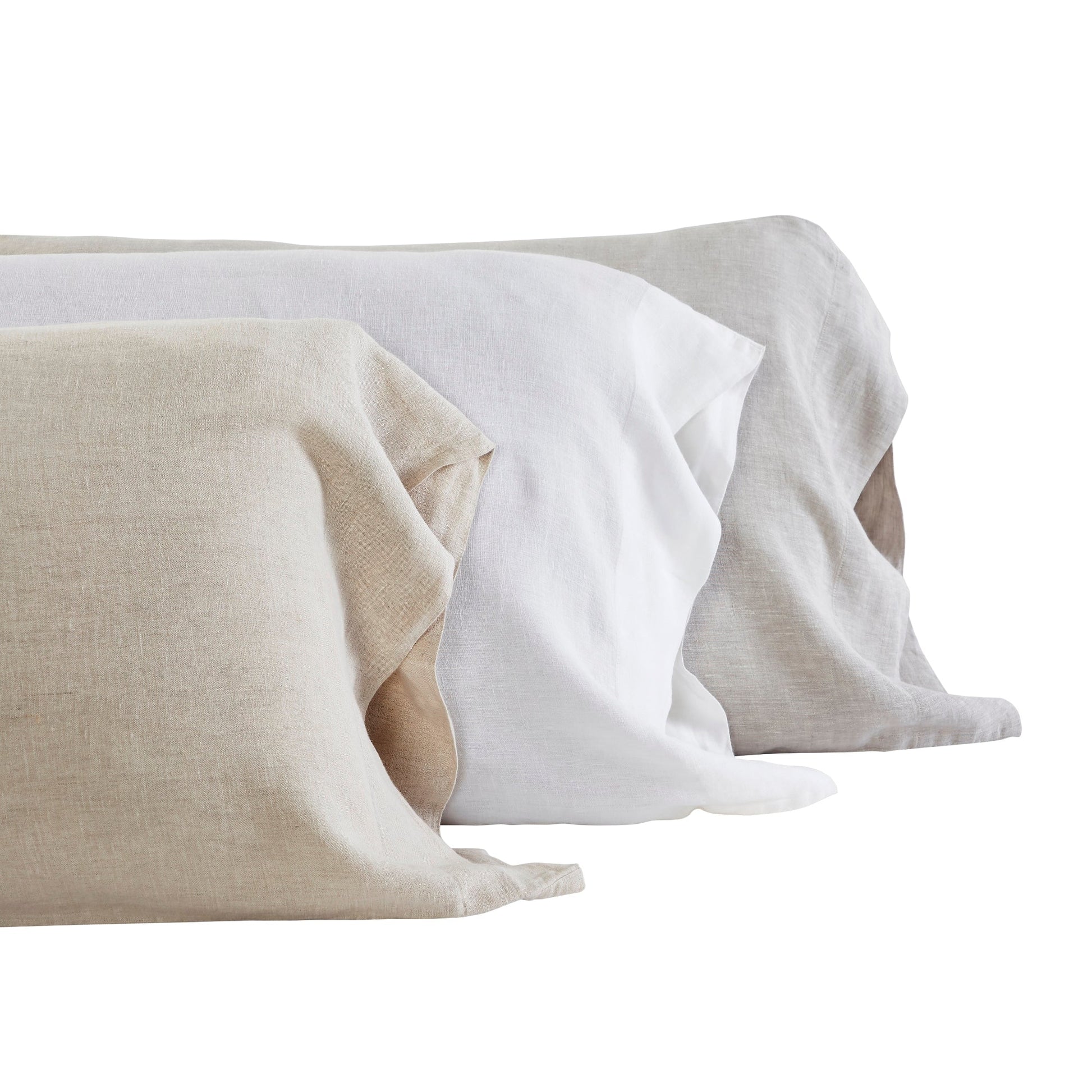 ASP-514-X_2|Stack of natural, white, and gray 100% linen pillow shams, showing soft textures and natural hues.