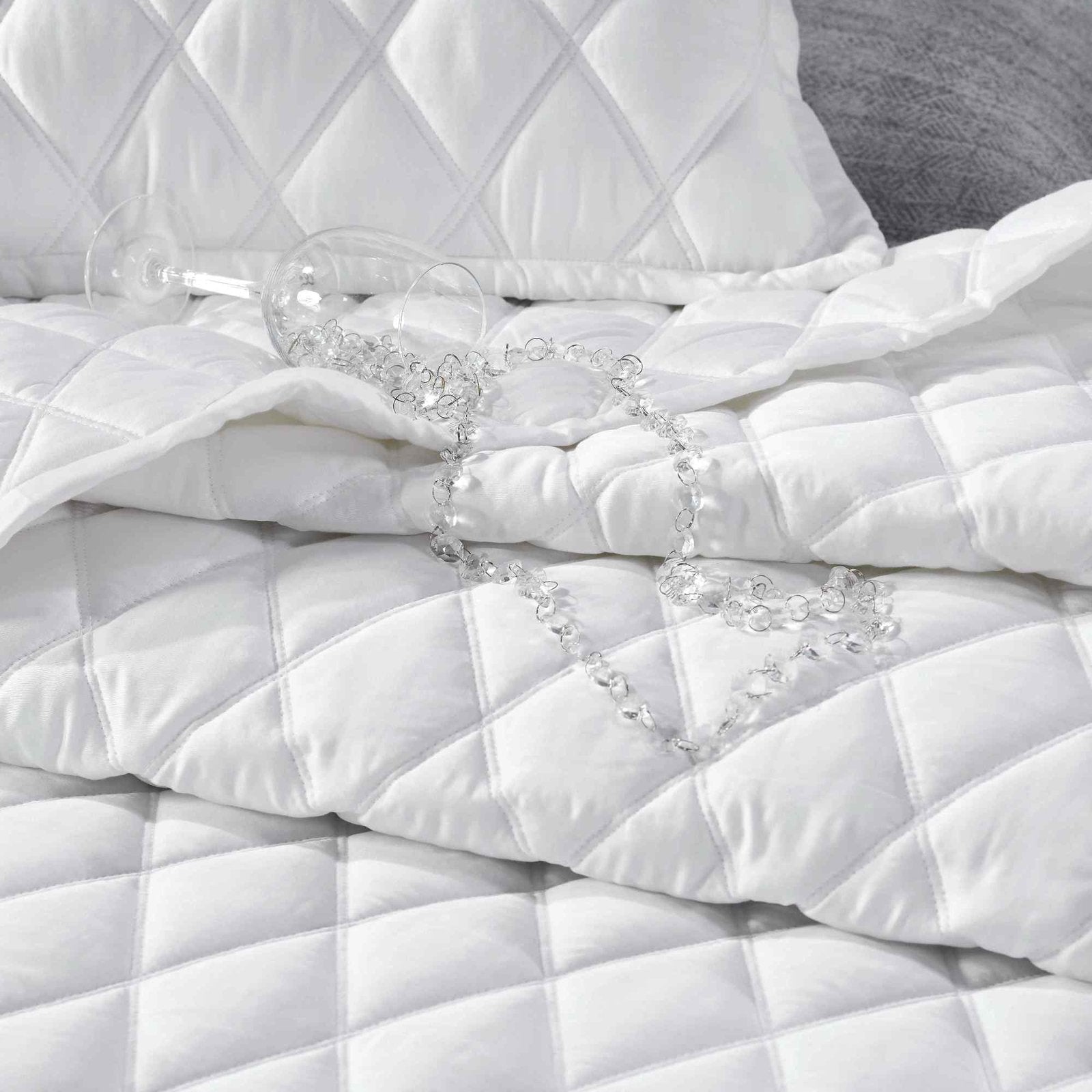 CL-179-11096_4|Luxurious white diamond quilted coverlet, offering a soft, plush feel and elegant design for premium bedroom comfort.