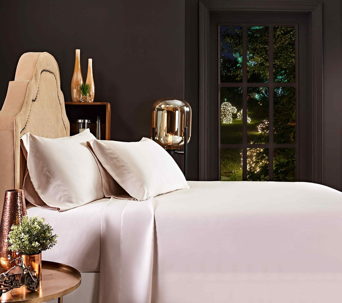 QSS-510-6080_5|Elegant blush pink 100% Lyocell sheet set on a bed, providing a soft, luxurious feel for tranquil sleep.