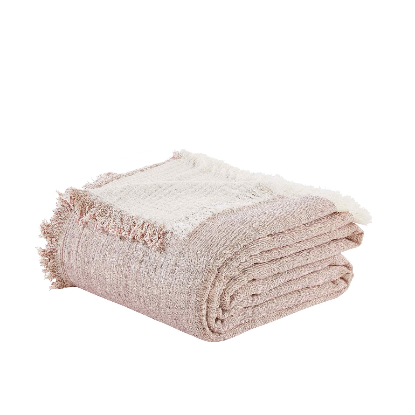 BT-110-9496_2|Neatly folded blush pink textured cotton blanket with fringed edges, perfect for adding cozy warmth to any space.