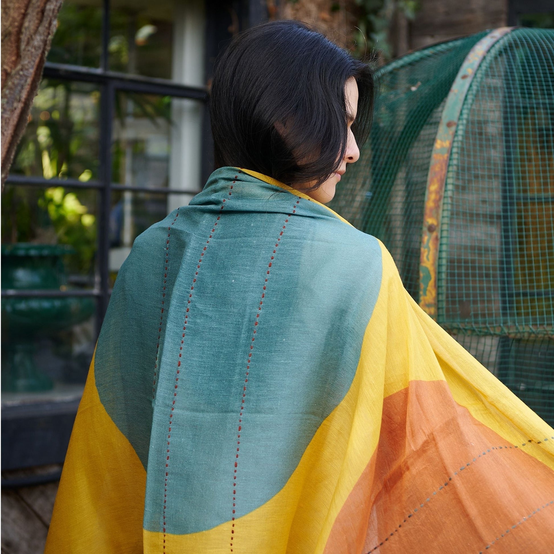 Cirq Sun Yellow Green Circle Pattern Hand Embroidered  Linen Silk Handloom Scarf draped elegantly over a model.