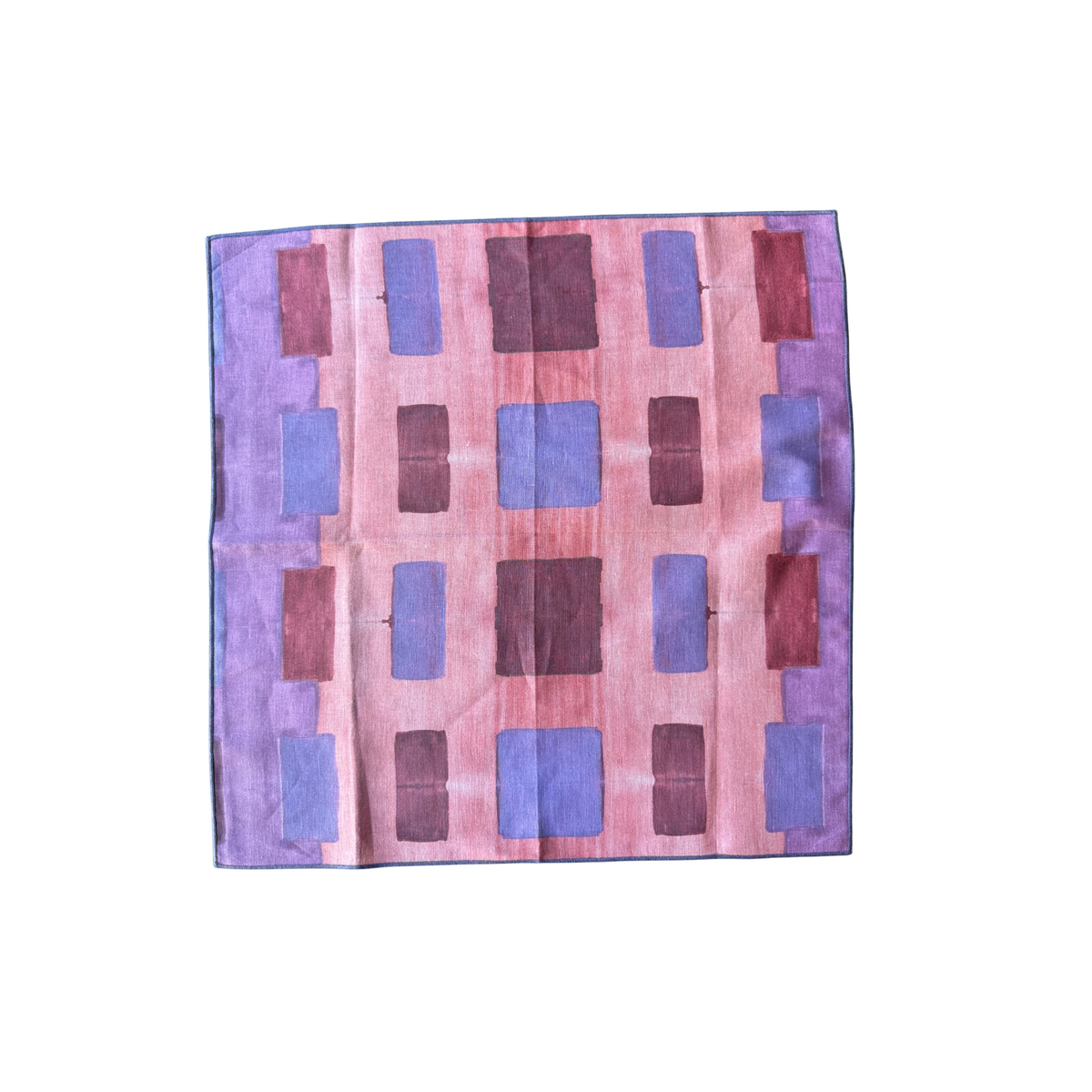 Pink Tapestry linen dinner napkin folded on place setting with napkin ring - Goldie Home