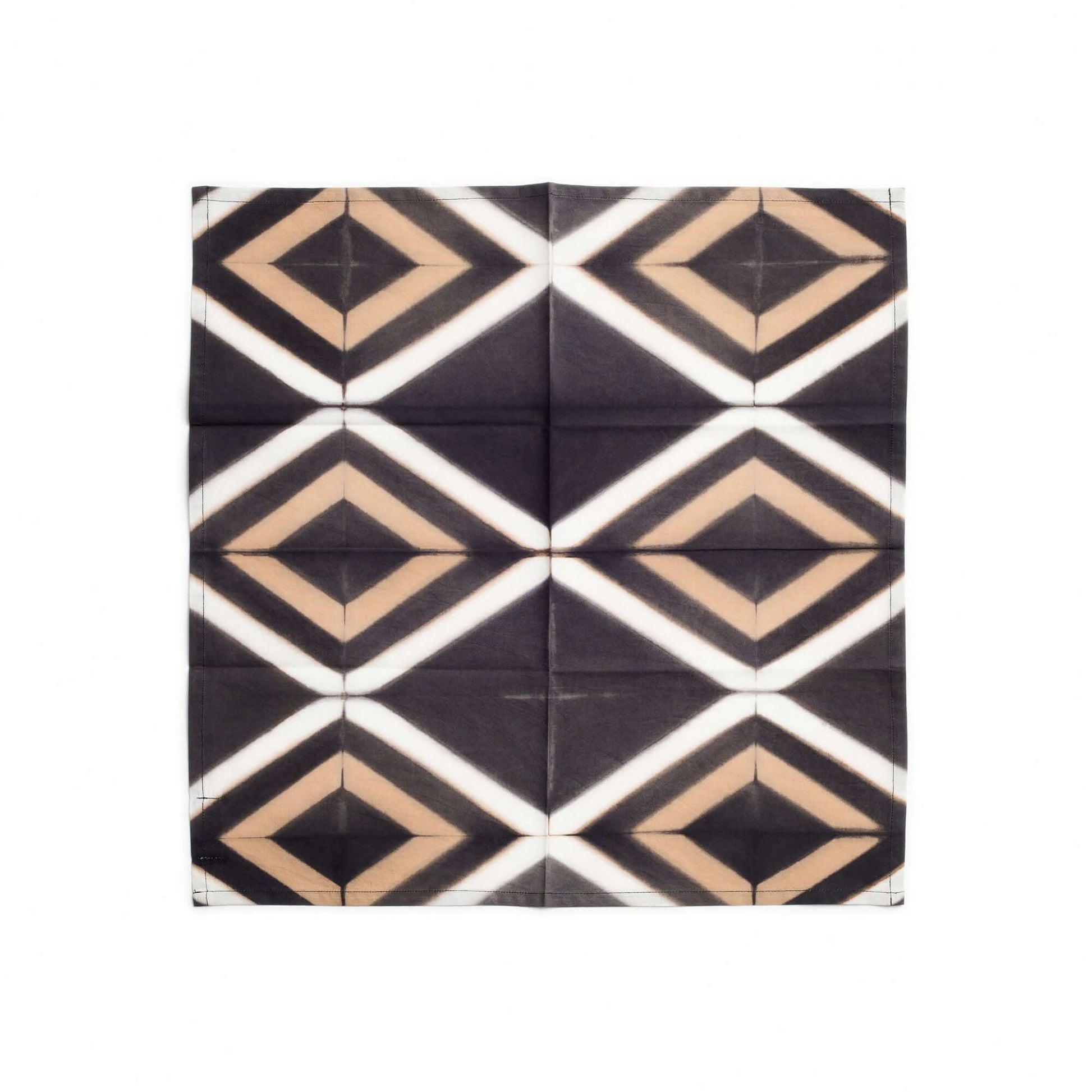 Tisa Indigo Hand Crafted Shibori Print Cotton Table Napkin set of 4 featuring a geometric diamond pattern in earthy tones.