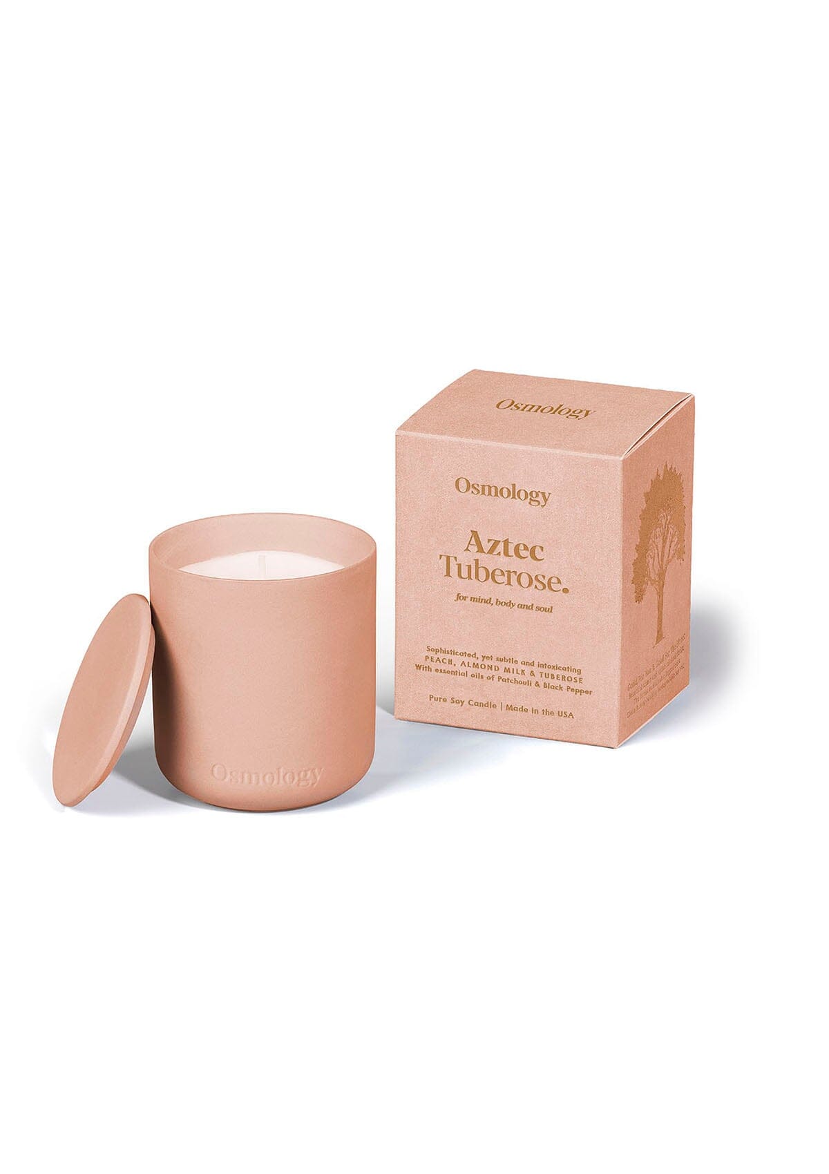 Osmology Aztec Tuberose peach ceramic candle pot with matching lid displayed next to product packaging