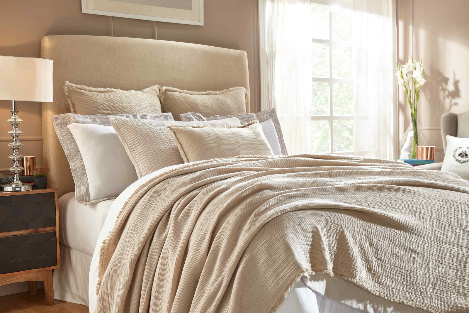 BT-101-9496_3|Cozy beige textured blanket artfully draped on a bed, providing warm, stylish comfort for modern bedroom aesthetics.