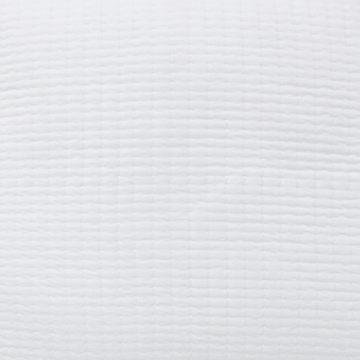 CL-267-11096_1|Elegant gold textured quilted coverlet draped over a bed in a stylish bedroom. Cozy, sophisticated, and comfortable bedding.
