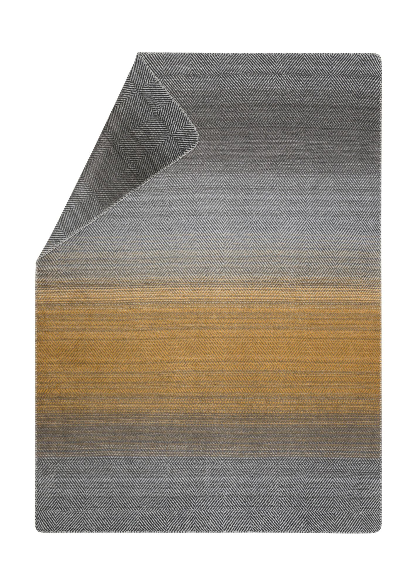 SAVONA throw "gradient herringbone" in terra cotta . Throw Blanket made by David Fussenegger , a family-run mill in Austria.