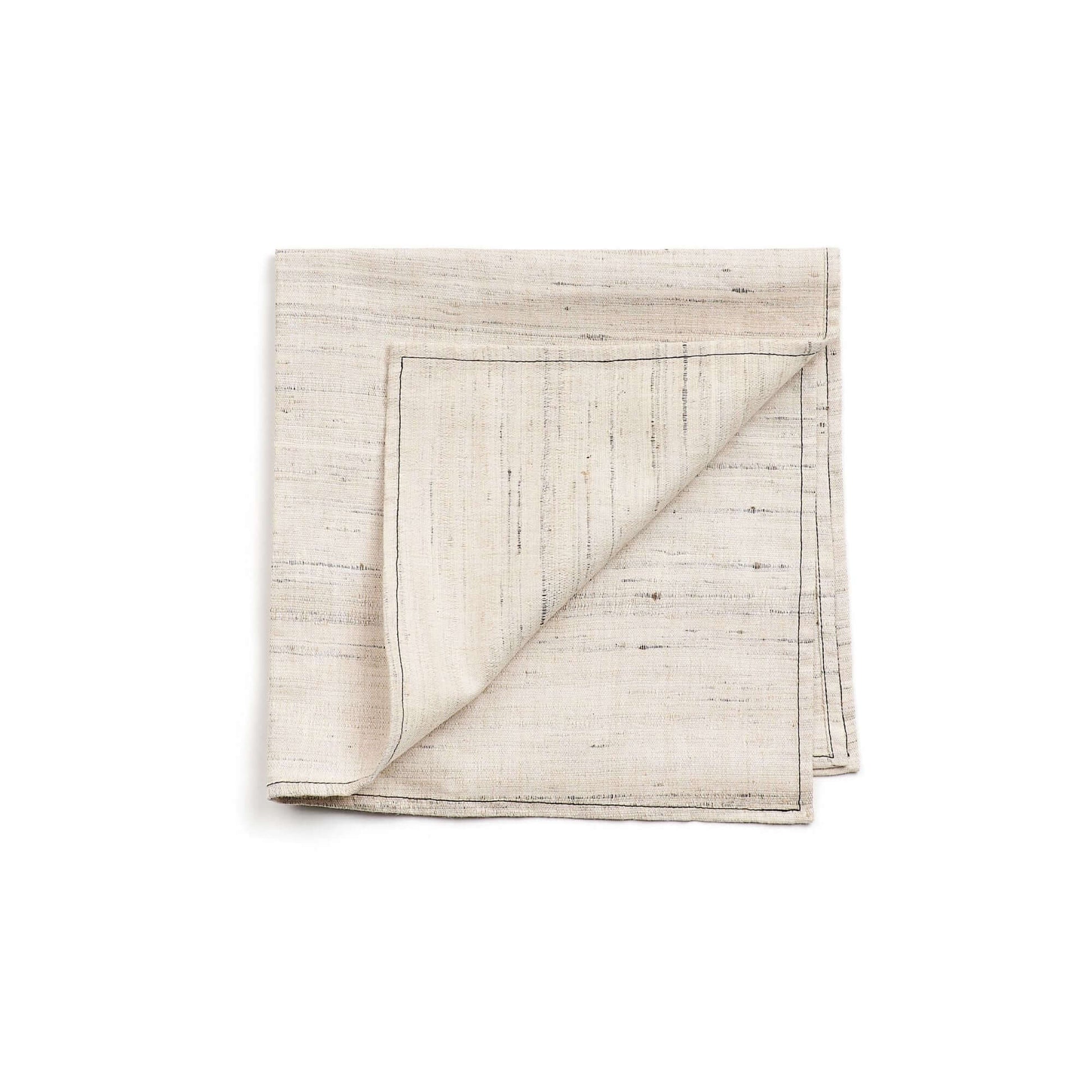 Kora Off White Peace Silk Handloom Napkin set of 4, luxuriously textured, crafted by skilled weavers in Eastern India.