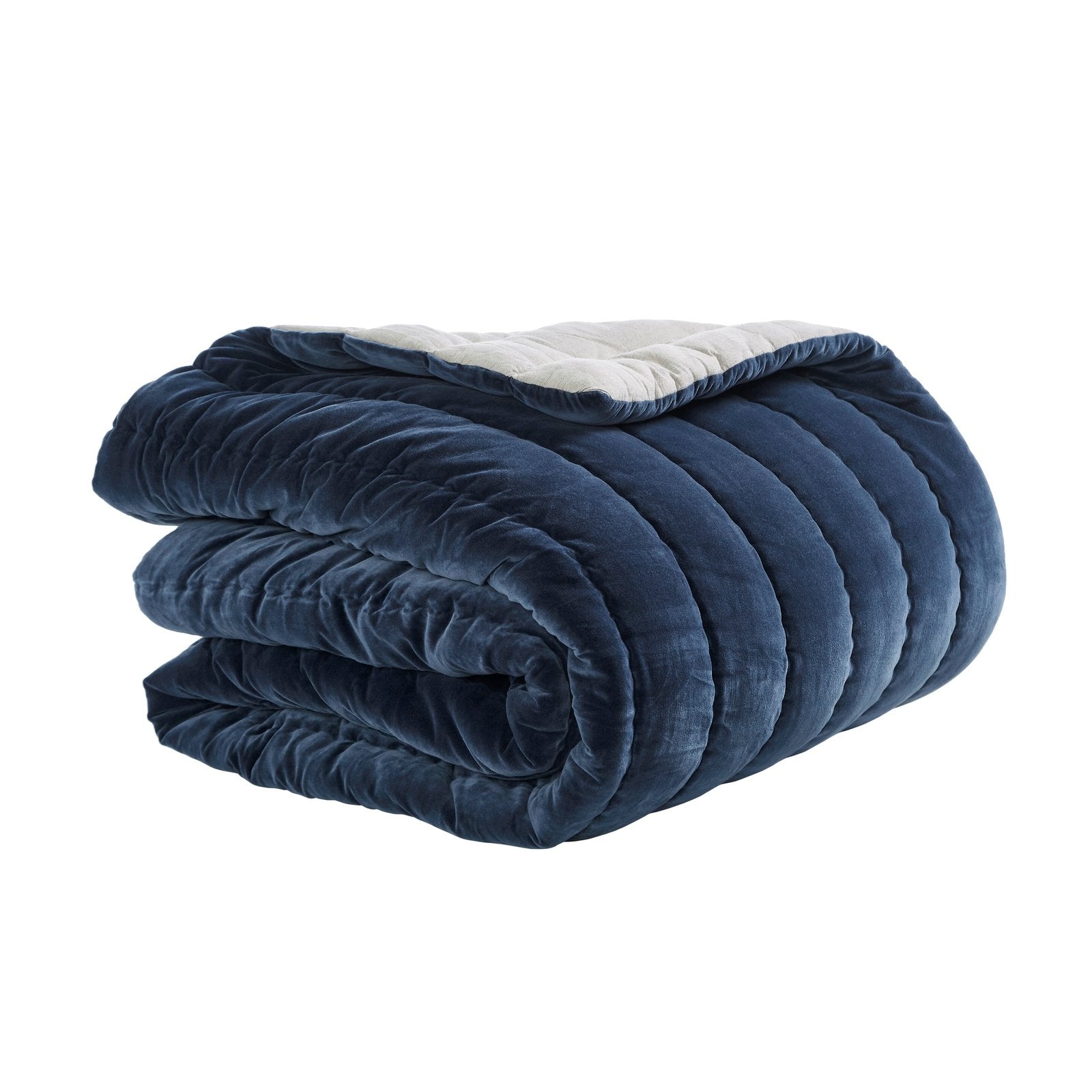 QT-335-11096_4|Folded navy velvet quilt with channel stitching, revealing a light reverse side. Plush texture for luxurious bedroom comfort.