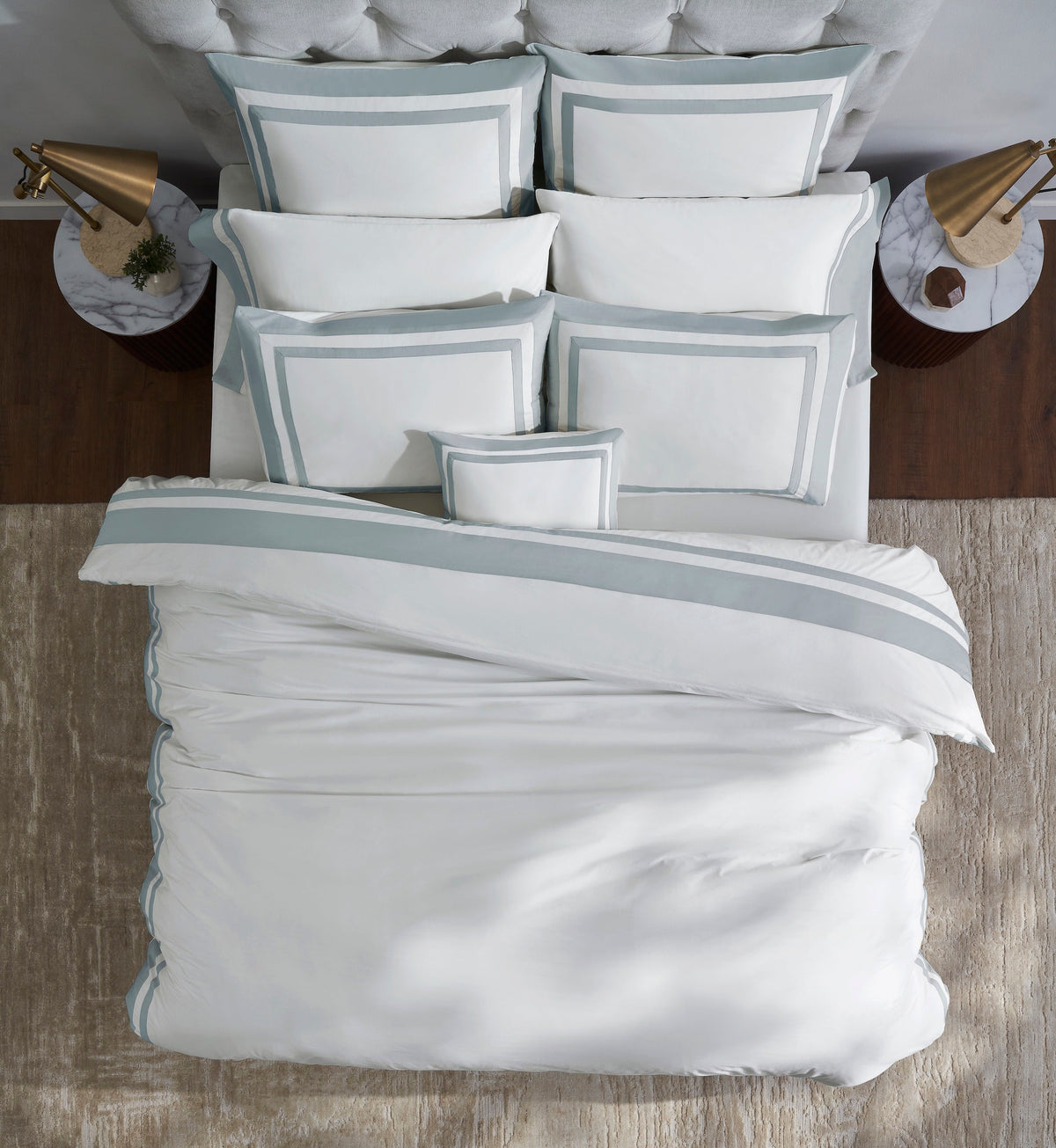 DT-066-10692_1|Elegant ivory cotton sateen duvet cover with a sophisticated gold border, enhancing a luxurious modern bedroom.