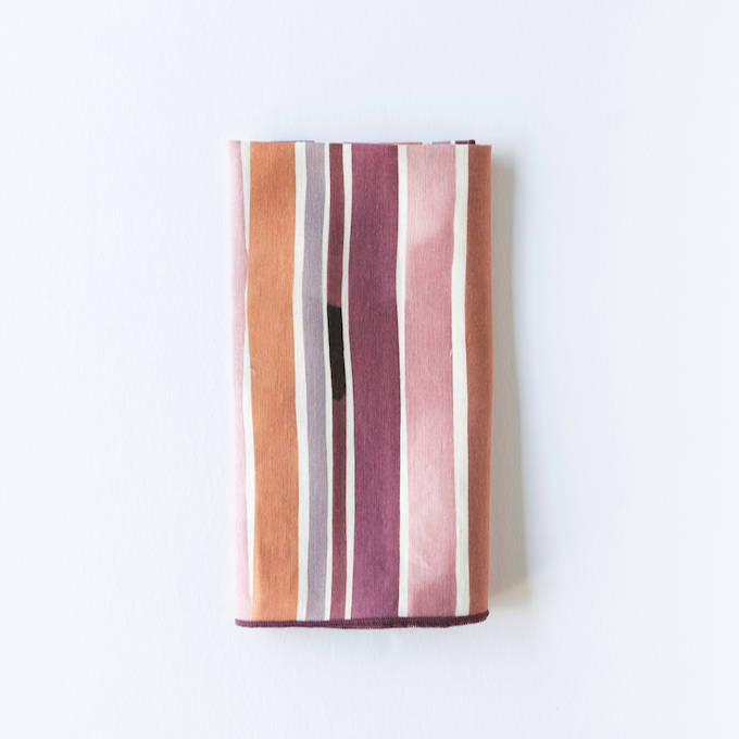 Lisbon Stripe linen dinner napkin styled on place setting - Goldie Home