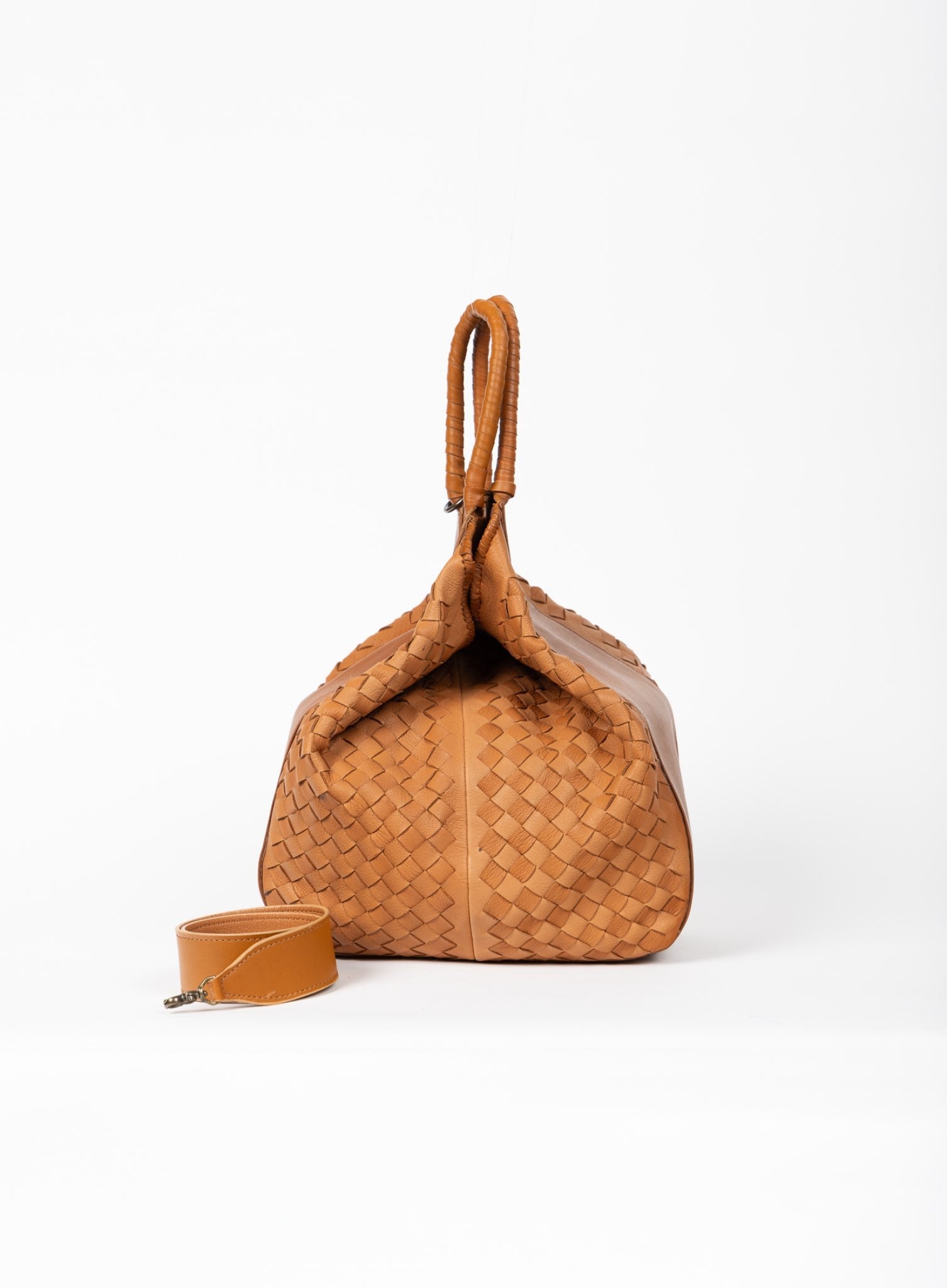 all day leather tote in black brown and black from our fall collection showcased by models in different angles.