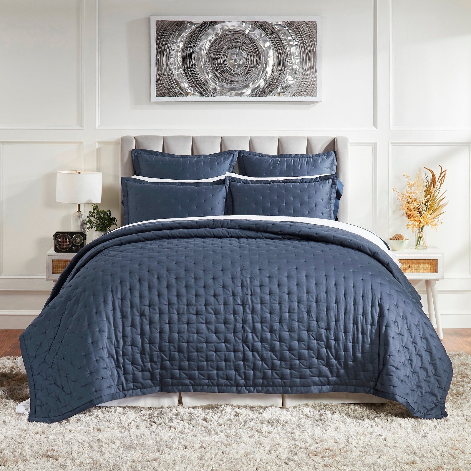 QT-357-11096_1|Full view of a serene bedroom featuring a rich navy blue quilted quilt set, complementing the modern decor. Luxurious.