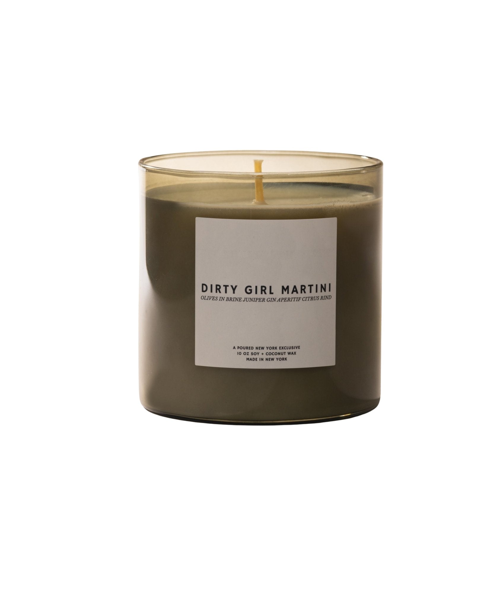 Poured New York 'Dirty Girl Martini' candle in olive green glass with a matching box with a girl in a martini decal on a neutral background