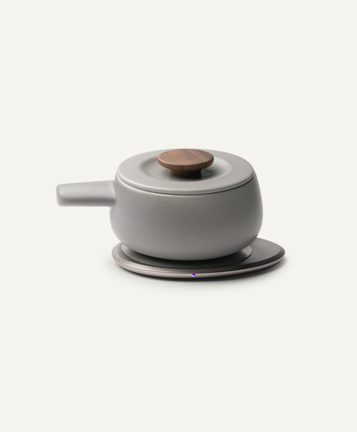 Fondi Self-Heating Ceramic Fondue 7.6 fl oz / 225 mL in Soft Gray on Ohom Charging Pad 3