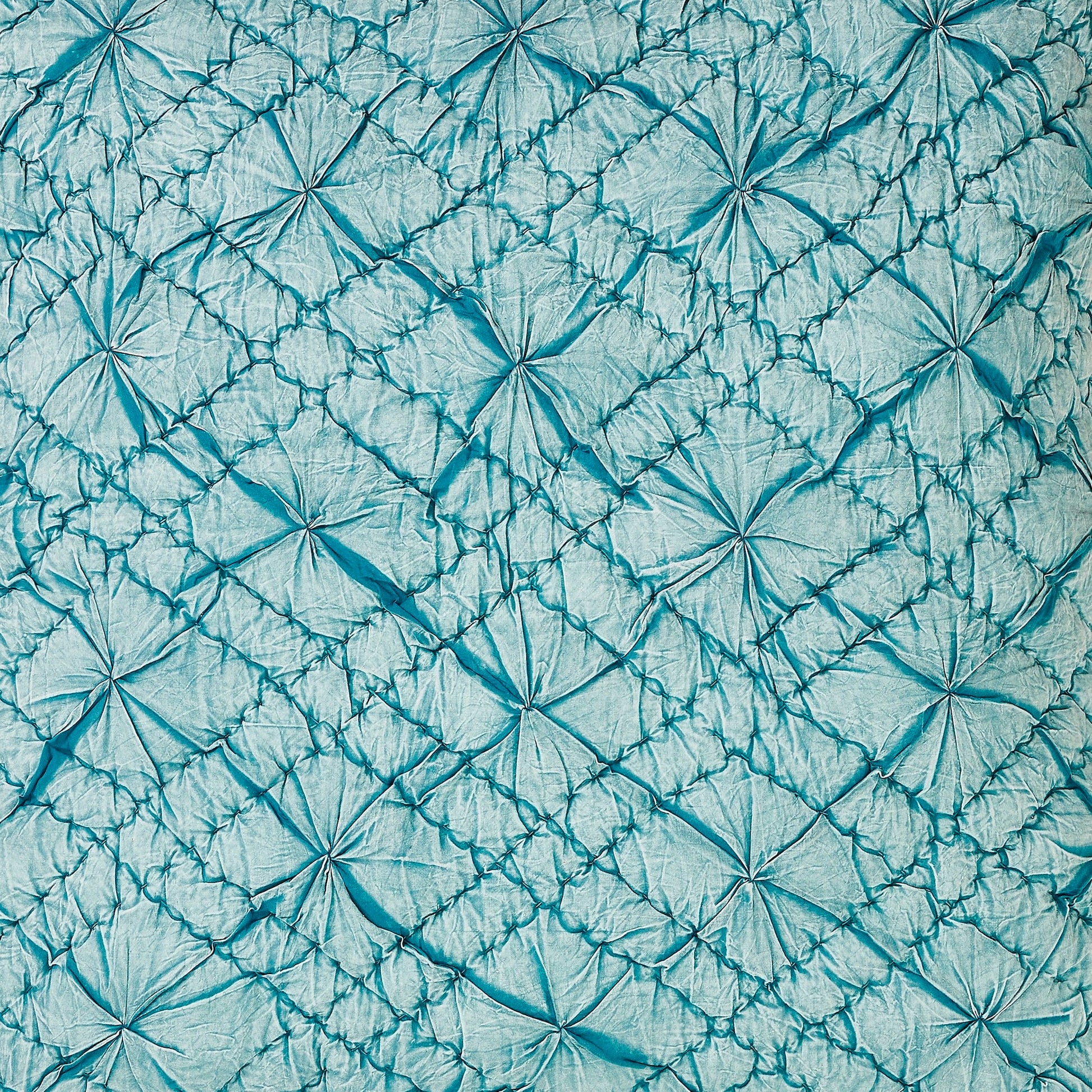 KS-365-2036_2|Serene light blue quilted bedspread or throw, featuring an elaborate ruched floral or starburst pattern, adding sophisticated texture to bedding.
