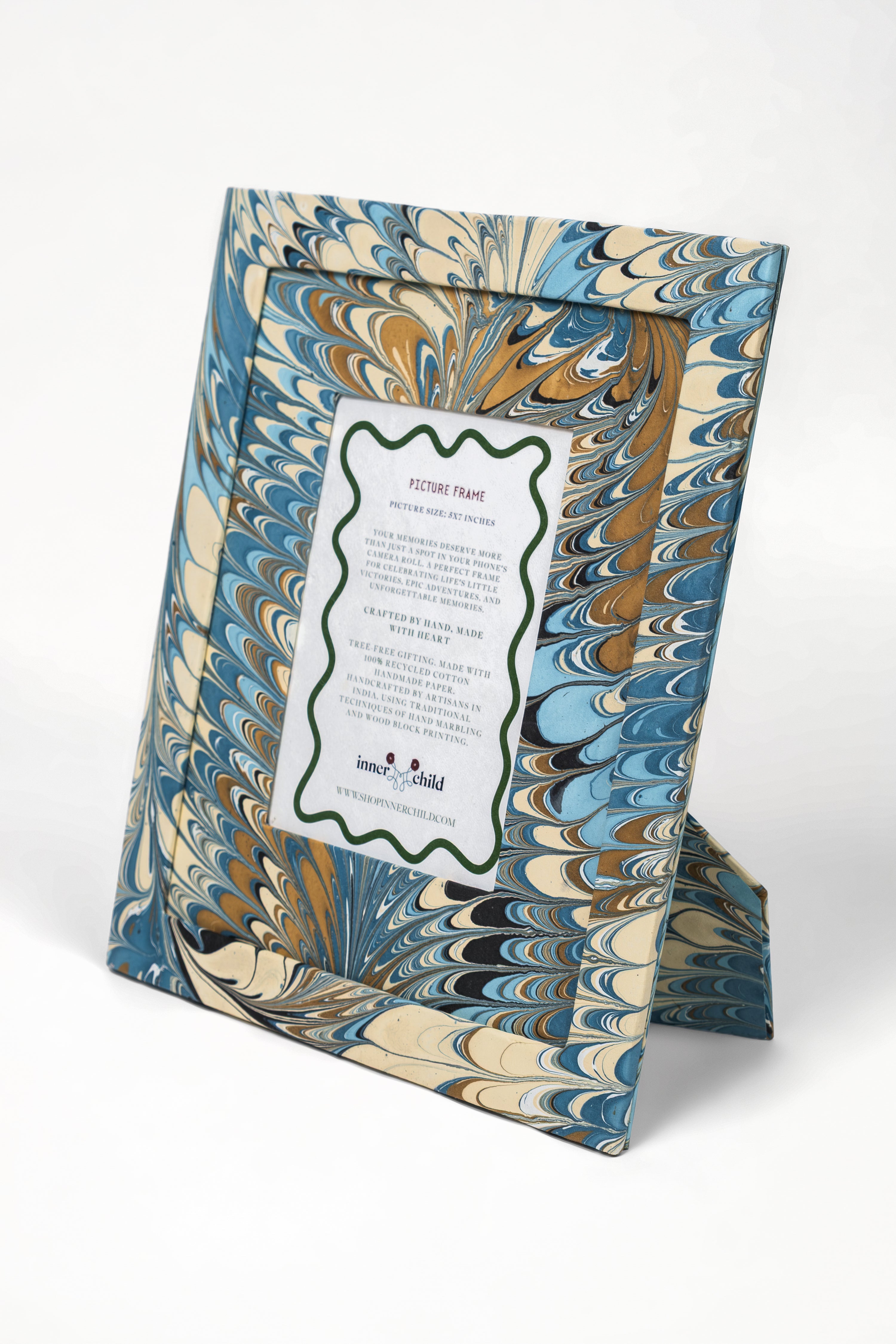 Hand-marbled standing picture frame with blue and gold swirls, Inner Child design