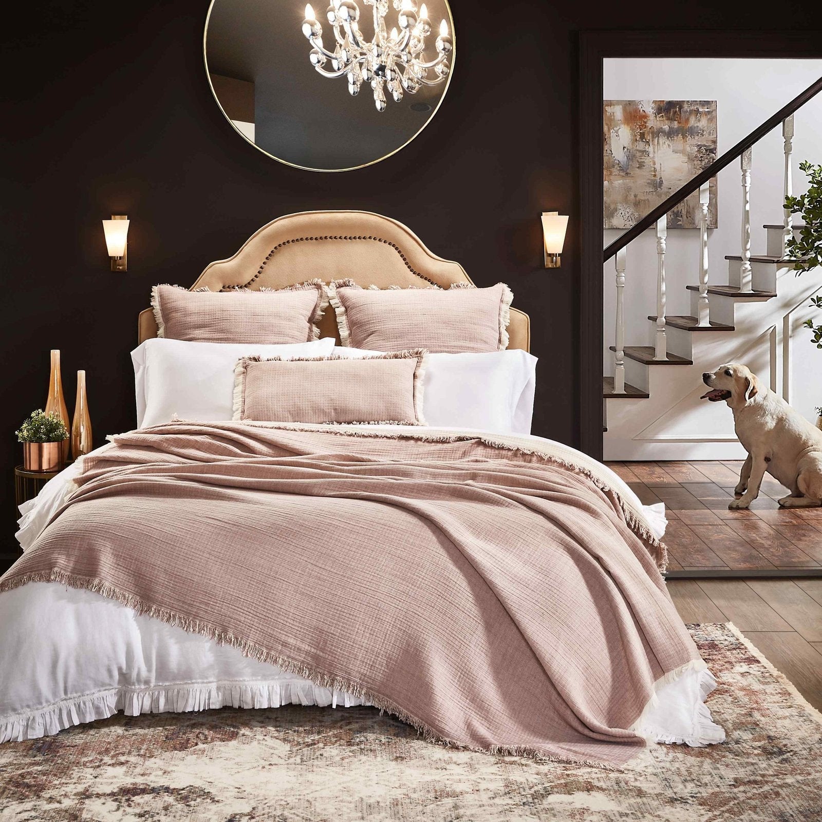 BT-110-11096_5|Blush pink textured cotton blanket with delicate fringe draped over a king bed, enhancing cozy bedroom decor.