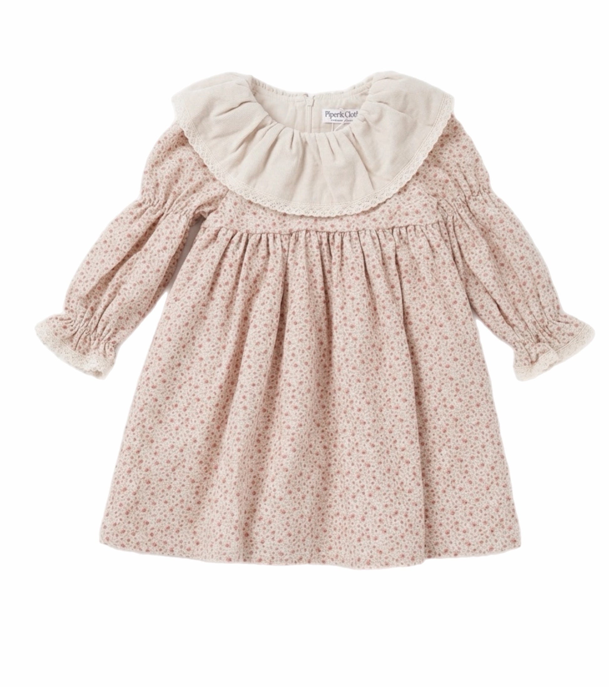 Pink floral dress with a white ruffled collar on a white background
