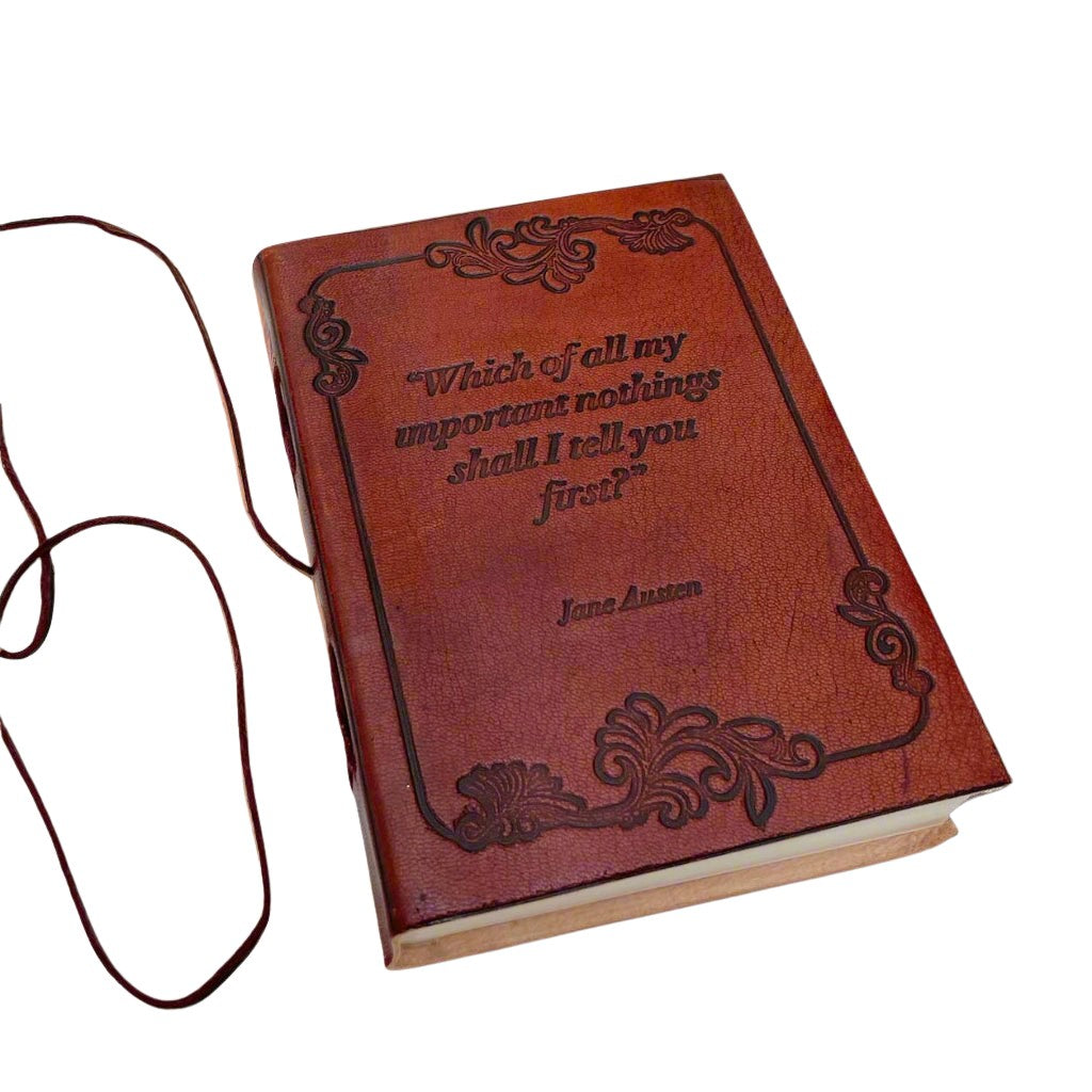 Earth-toned leather journal featuring embossed life quote – thoughtful companion for journaling and sketching on the go