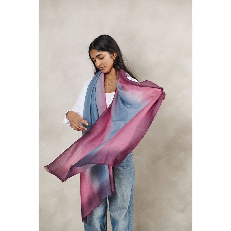 Iris Haze Blue Pink Cashmere Merino Handloom Scarf displayed by a model, showcasing its unique color blend.