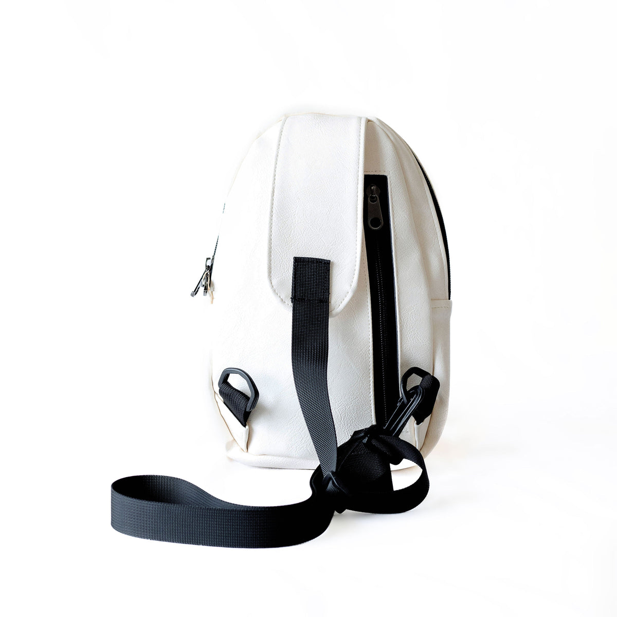 Buru white vegan leather sling bag flat lay #color_white