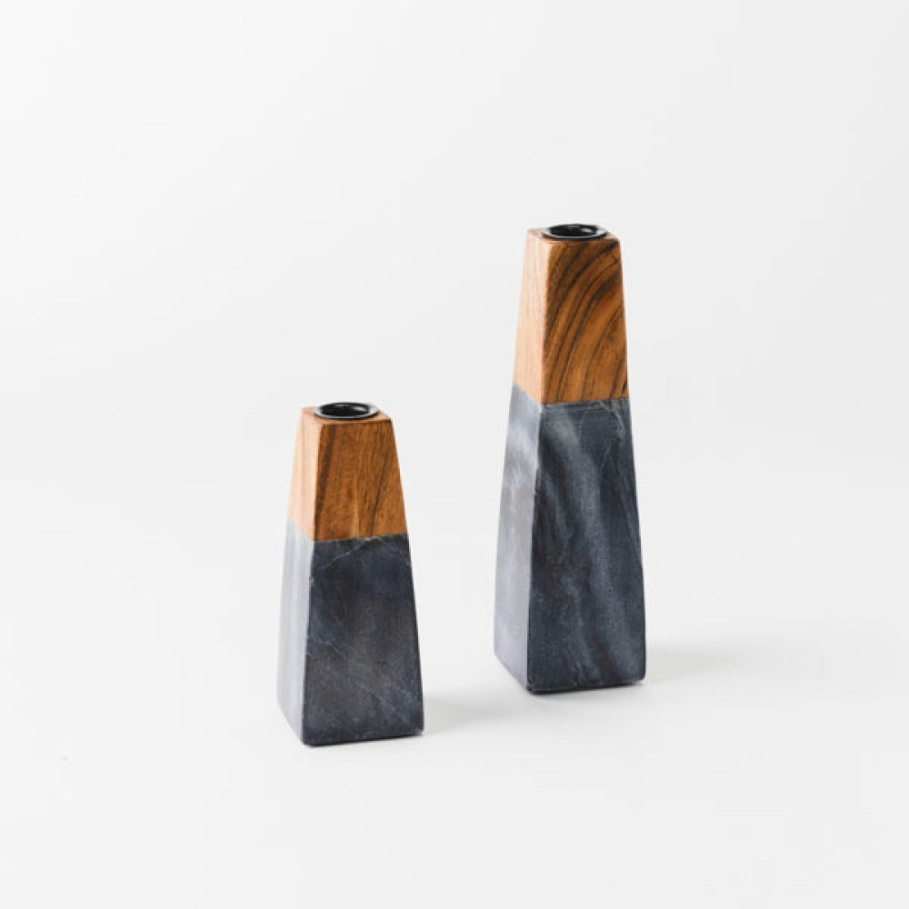 sculptural candleholder styled on table with candle