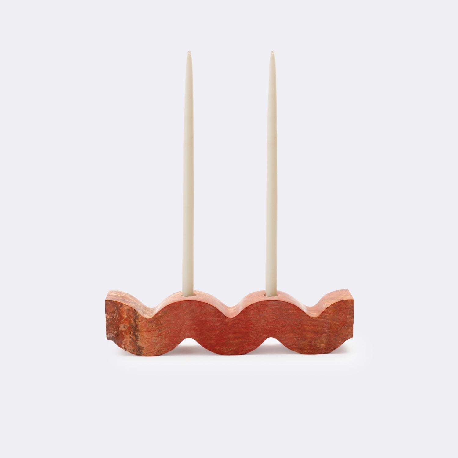 Wavy gemstone candelabra Jasper. Holds either 2 or 3 candles. Handcarved with stone carpentry techniques traditional to Perú and certified ethically hand-crafted by NEST.
