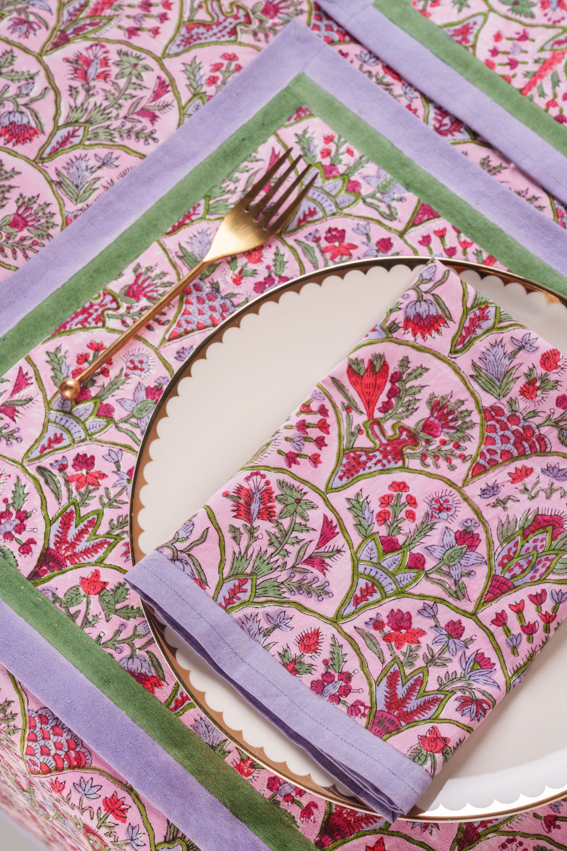 Pink arch blockprint napkins set of 4 on plate with gold fork from Inner Child