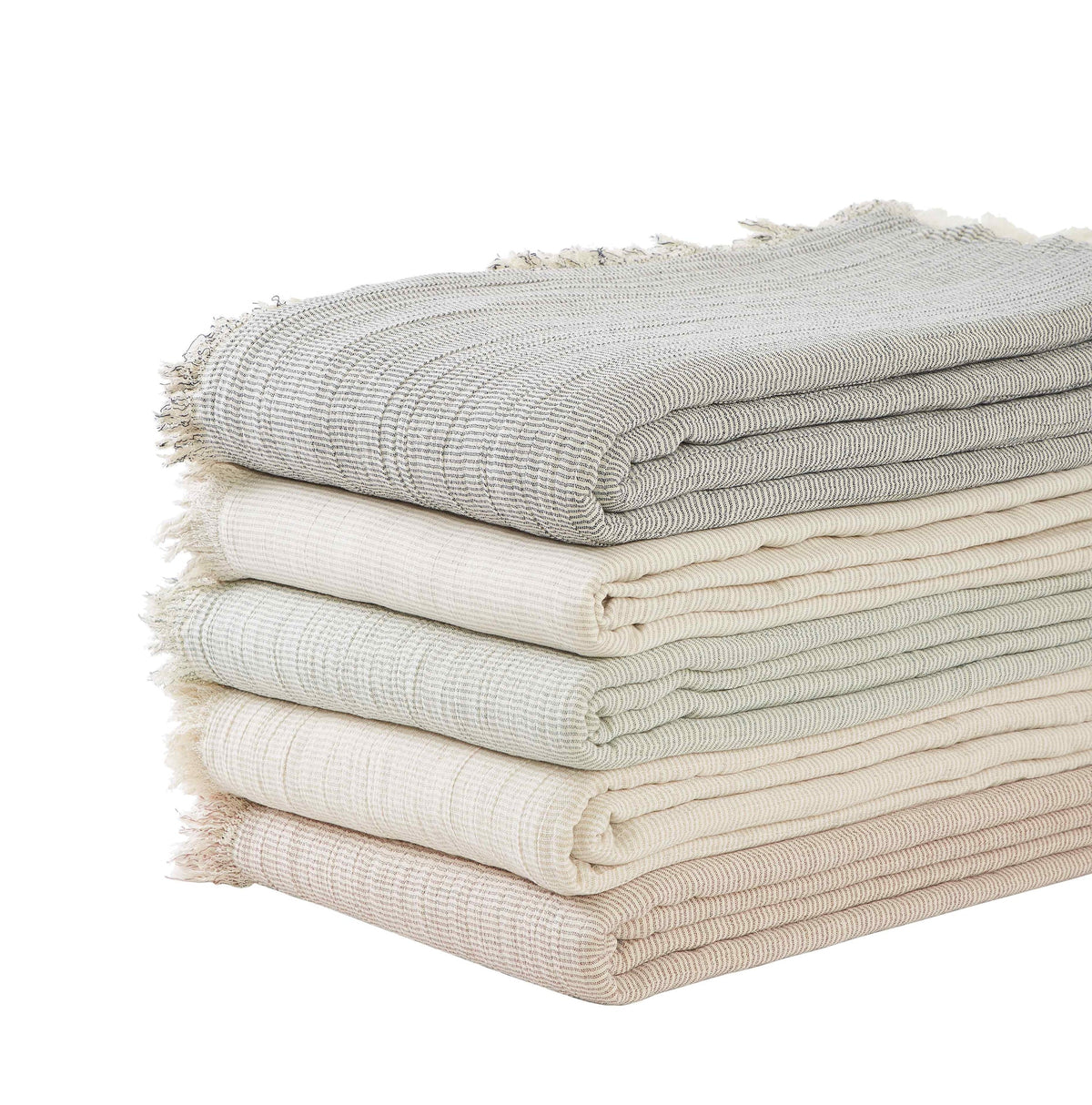 BT-111-11096_1|Elegant, textured sage green blanket with fringe detail covers a luxurious bed, enhancing bedroom comfort and style.