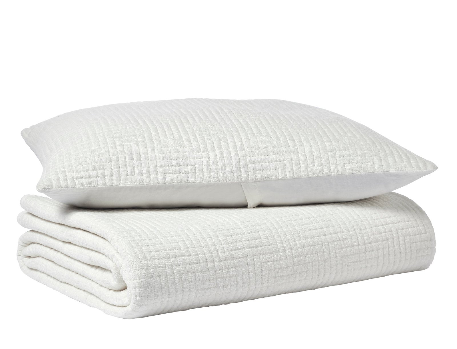 CL-199-9496_6|White quilted coverlet with a distinctive geometric maze pattern, folded neatly with a matching decorative pillow.