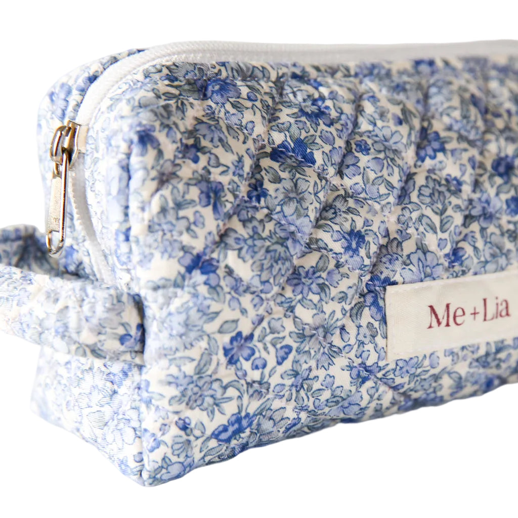 Blue Blossom Make-up Pouch Small — blue floral quilted cotton pouch, angled view with zip