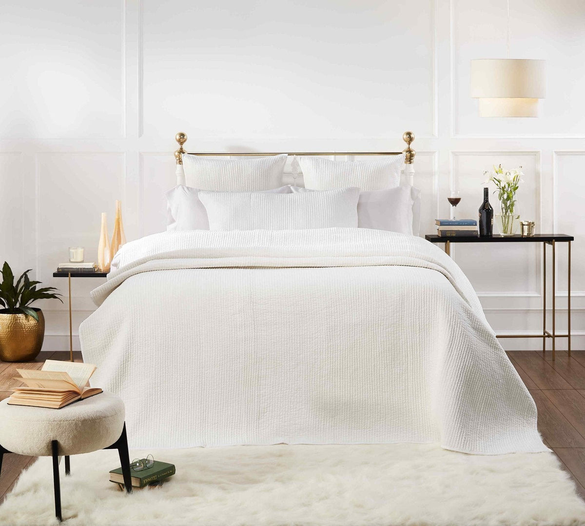 CL-157-9496_5|Close-up of a premium white textured coverlet, showcasing its intricate stitched pattern and soft, inviting texture.