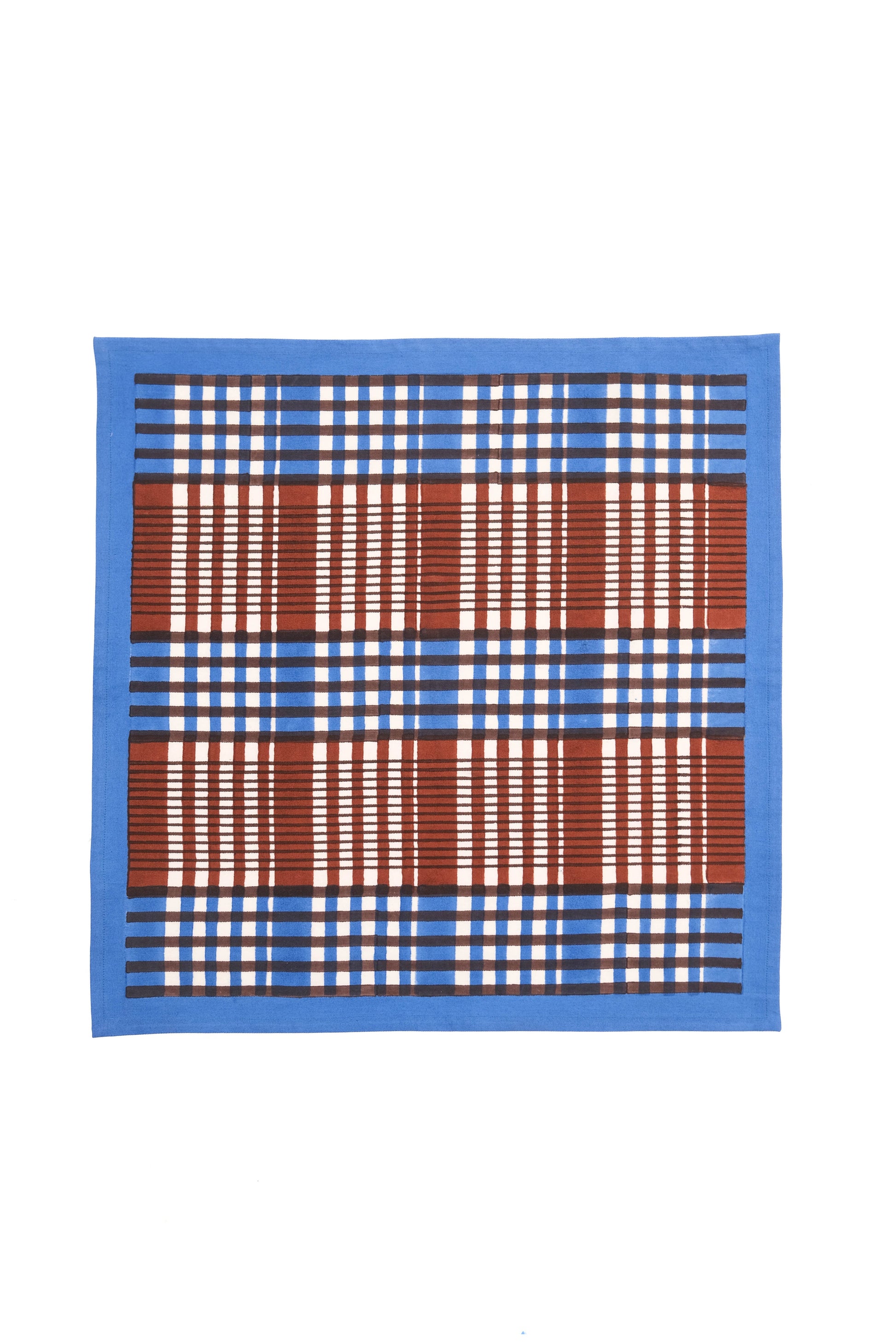 Brown and blue Shetland plaid napkin with blockprint design