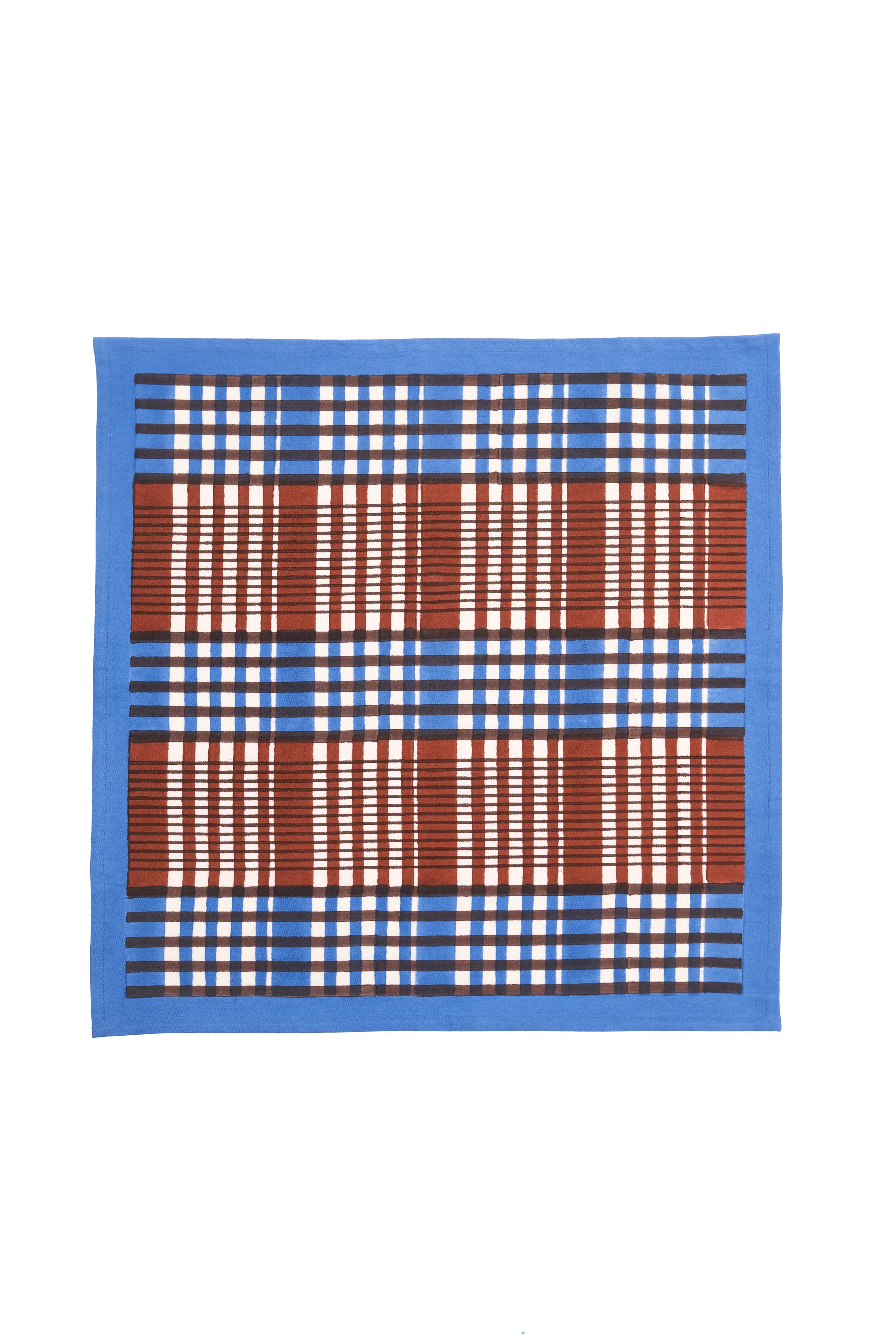 Brown and blue Shetland plaid napkin with blockprint design