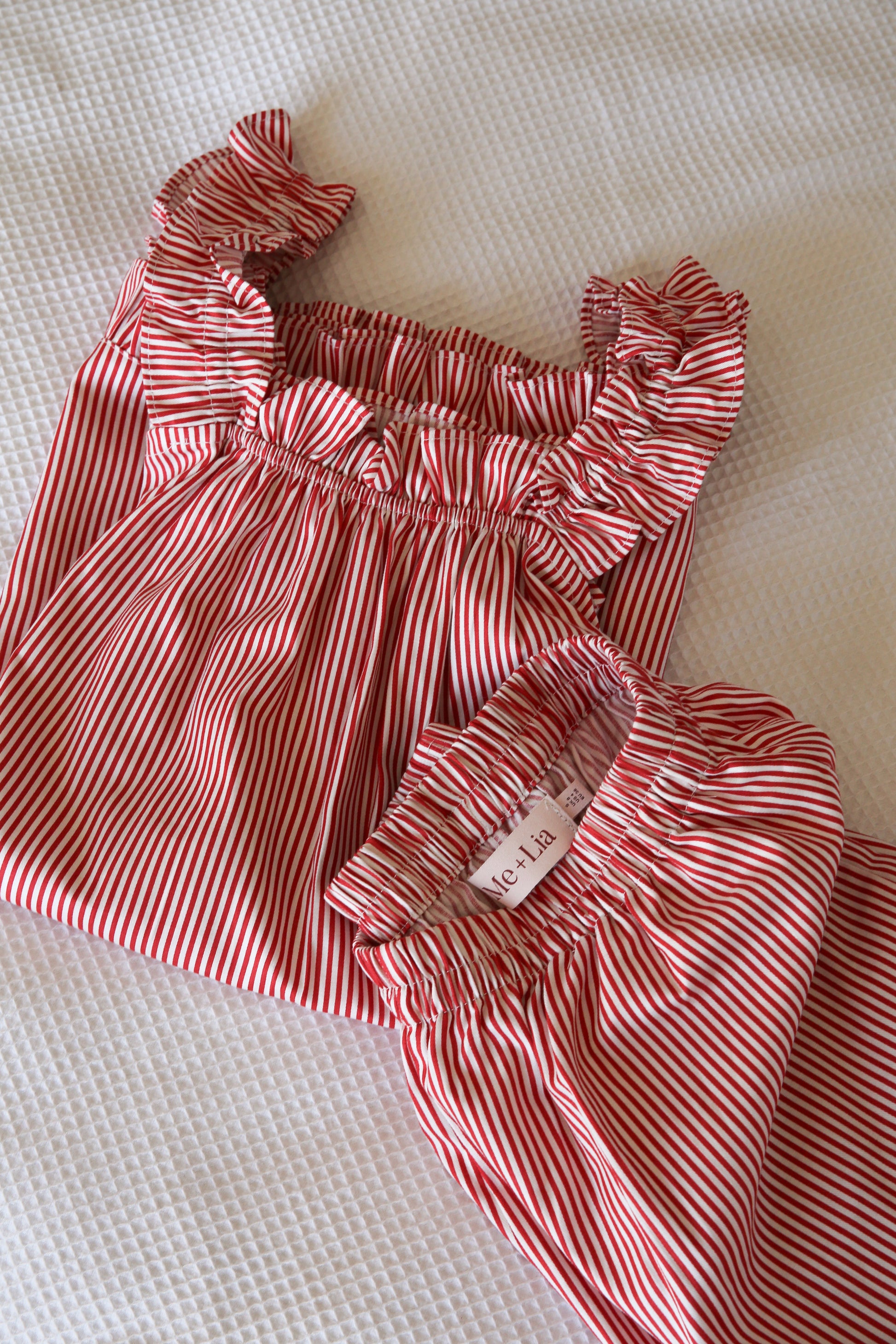 Stella red and white striped sleeveless loungewear set.