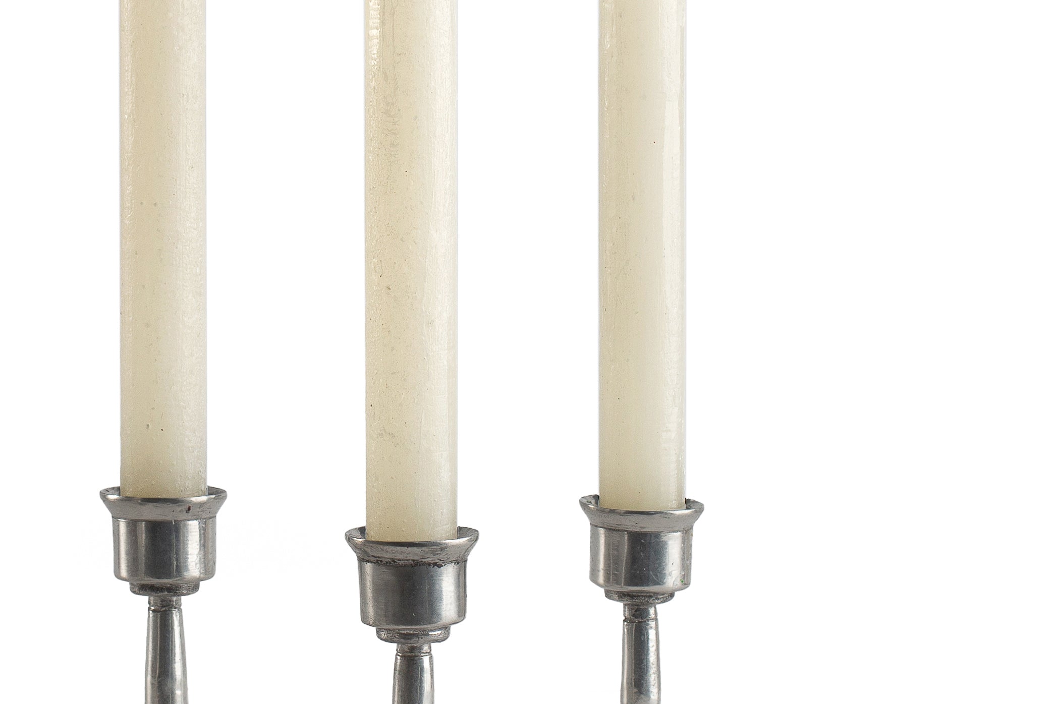 4 cream frosted tapers in pewter taper holders.  Hand crafed in South Africa