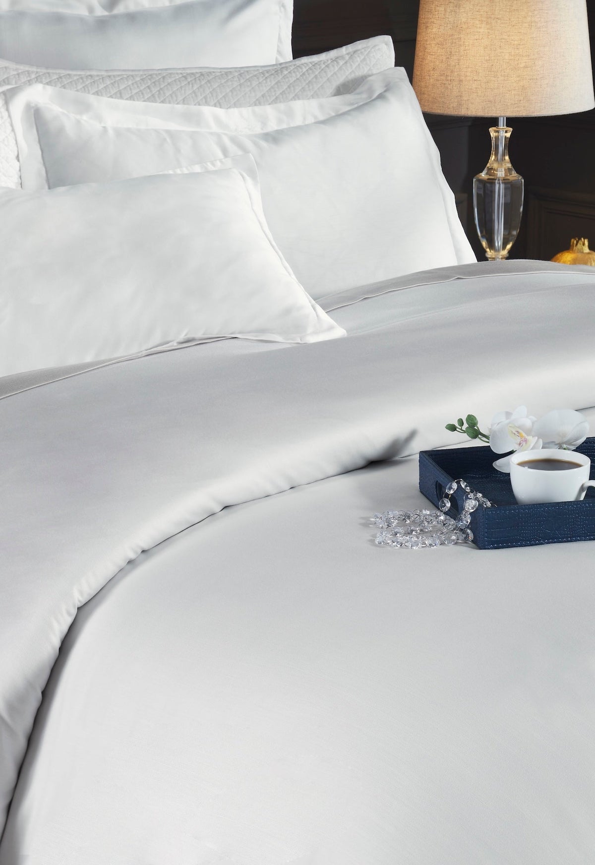 DT-047-10692_4|Soft white duvet cover providing a comfortable sleep surface, styled with elegant details for a refined bedroom.