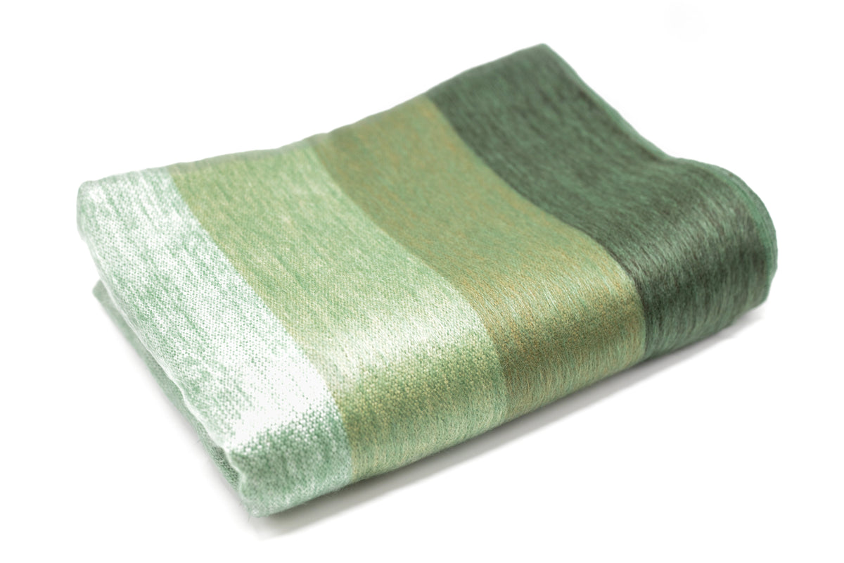 green striped throw blanket folded