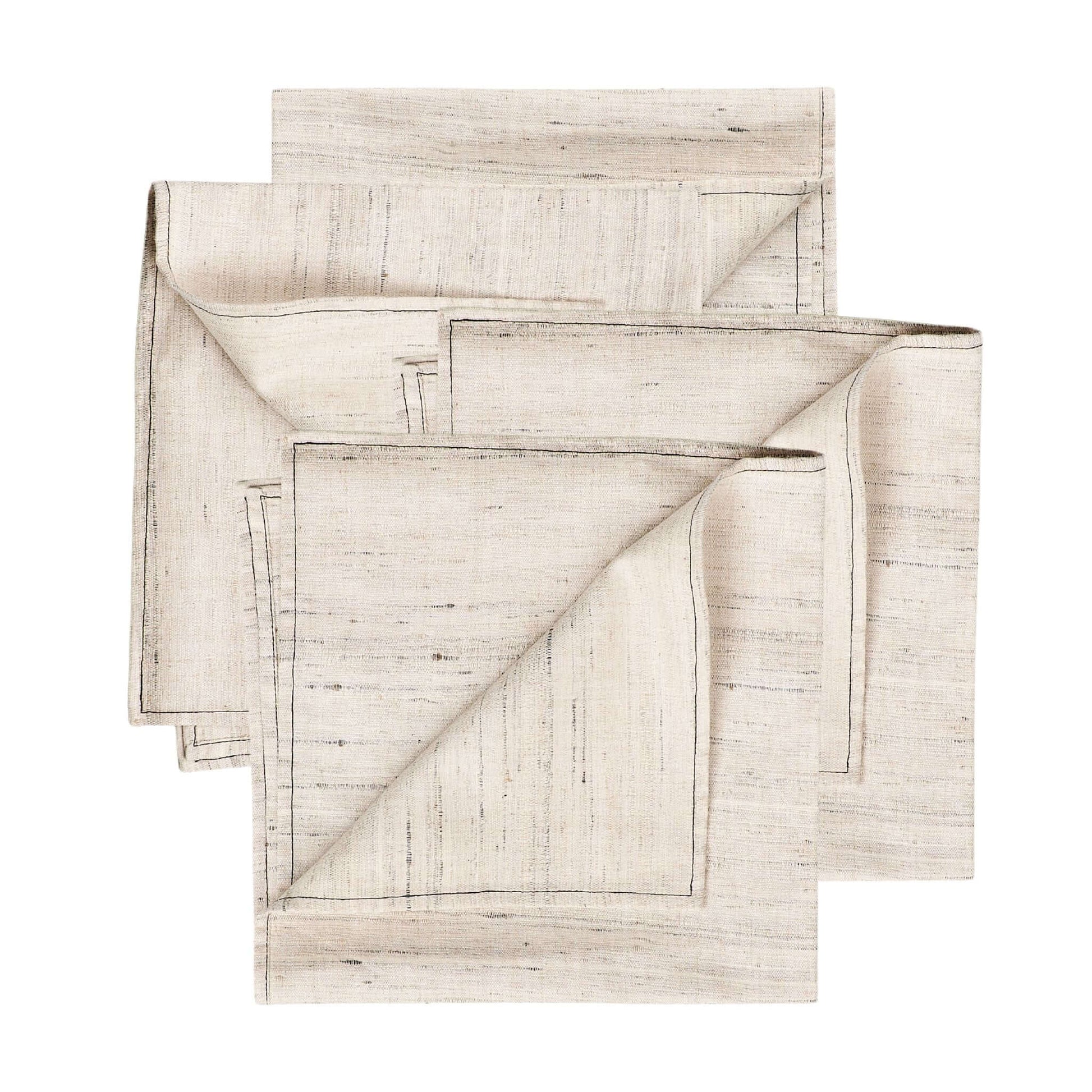 Kora Off White Peace Silk Handloom Napkin set of 4 displayed in a neatly folded arrangement.
