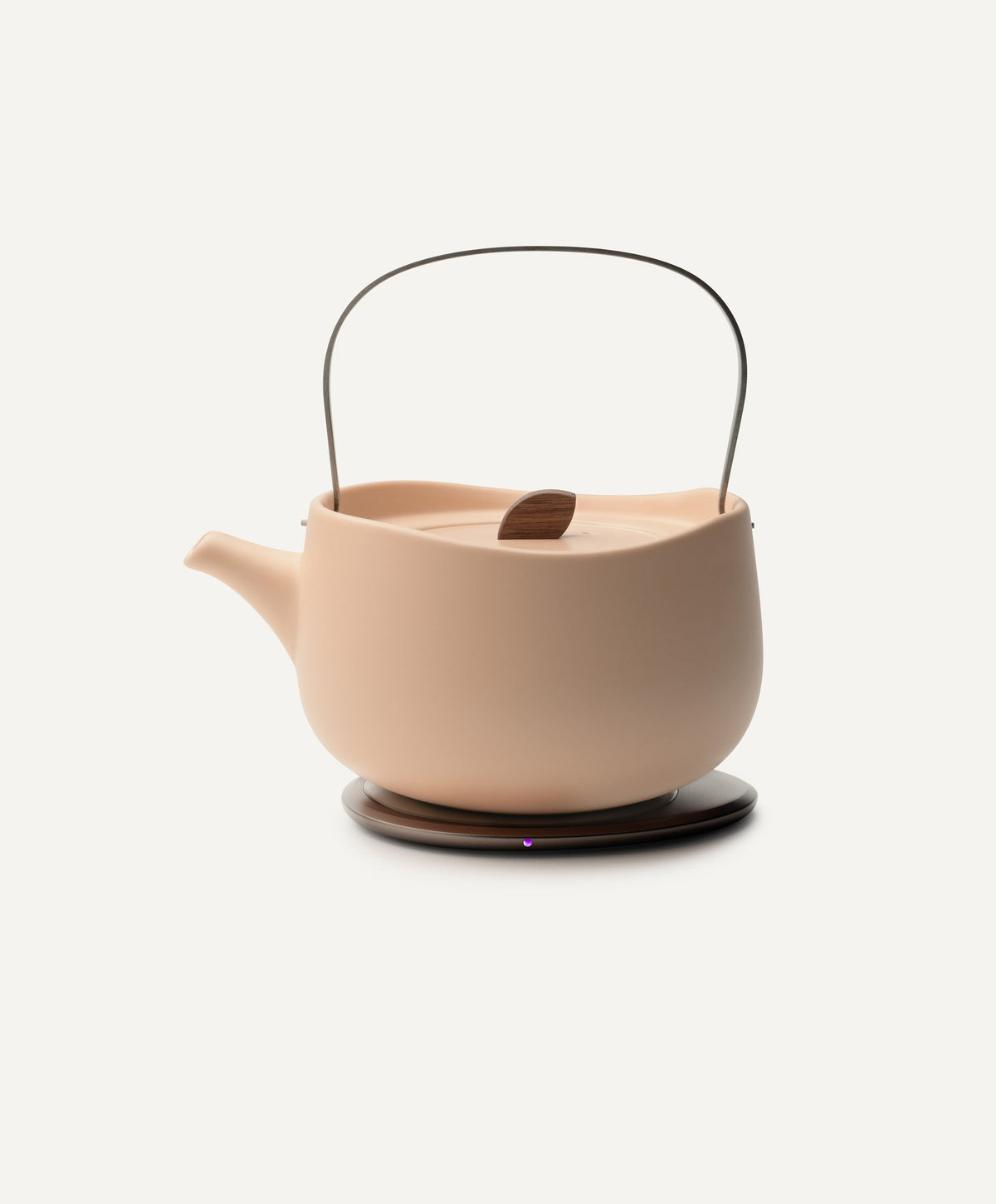 Leiph Self-Heating Ceramic Teapot Set 20 fl oz / 600 mL in Rosy Apricot on Ohom Charging Pad 3