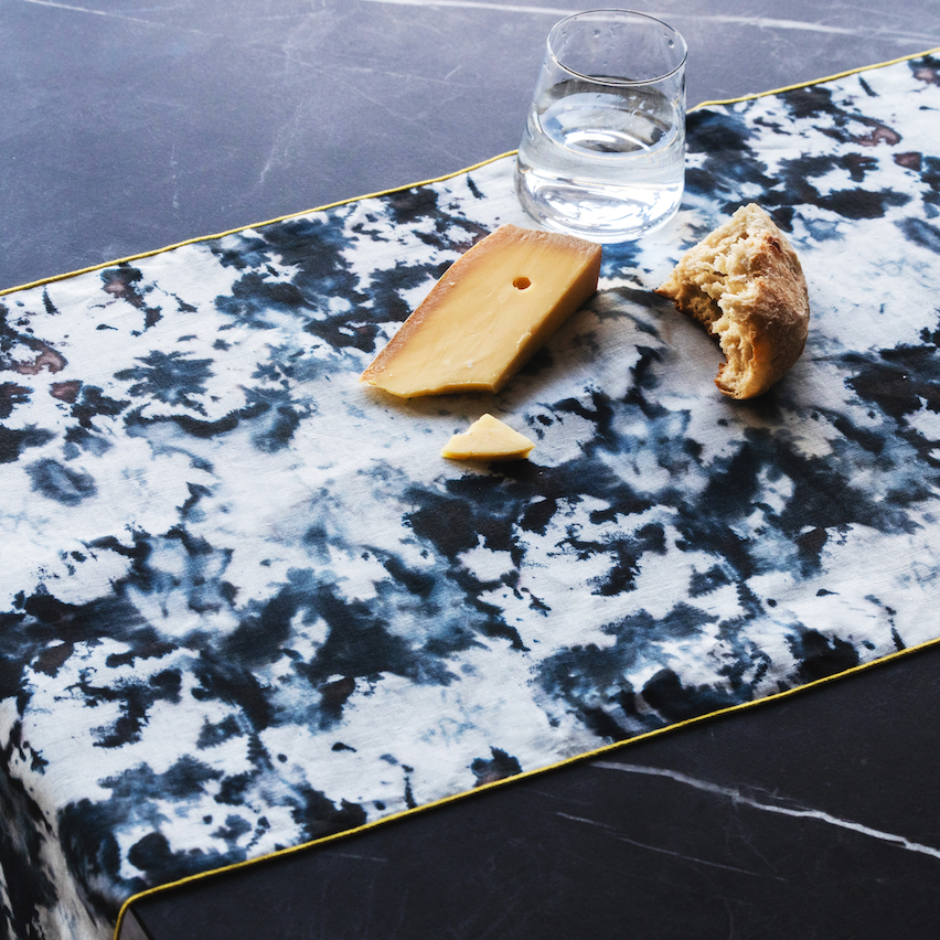 Grey Marble linen table runner close up of maroon trim detail - Goldie Home