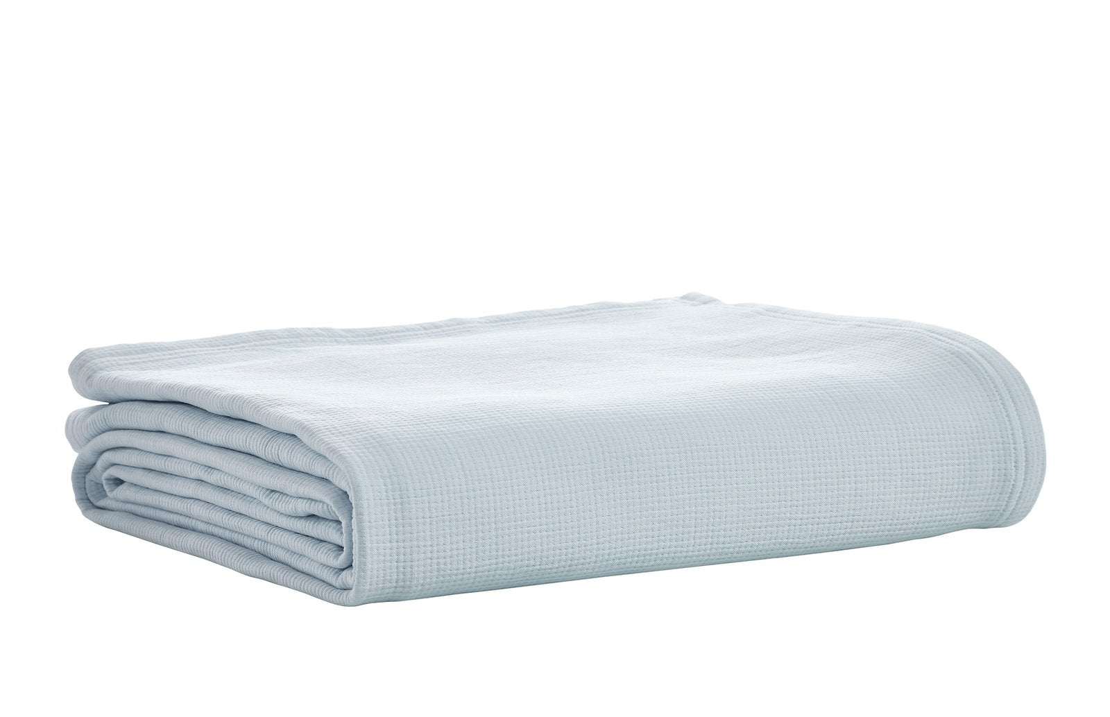 BL-859-9496_7|Soft light blue waffle weave cotton blanket, neatly folded. Cozy, breathable, ideal for all seasons and stylish layering on any bed.