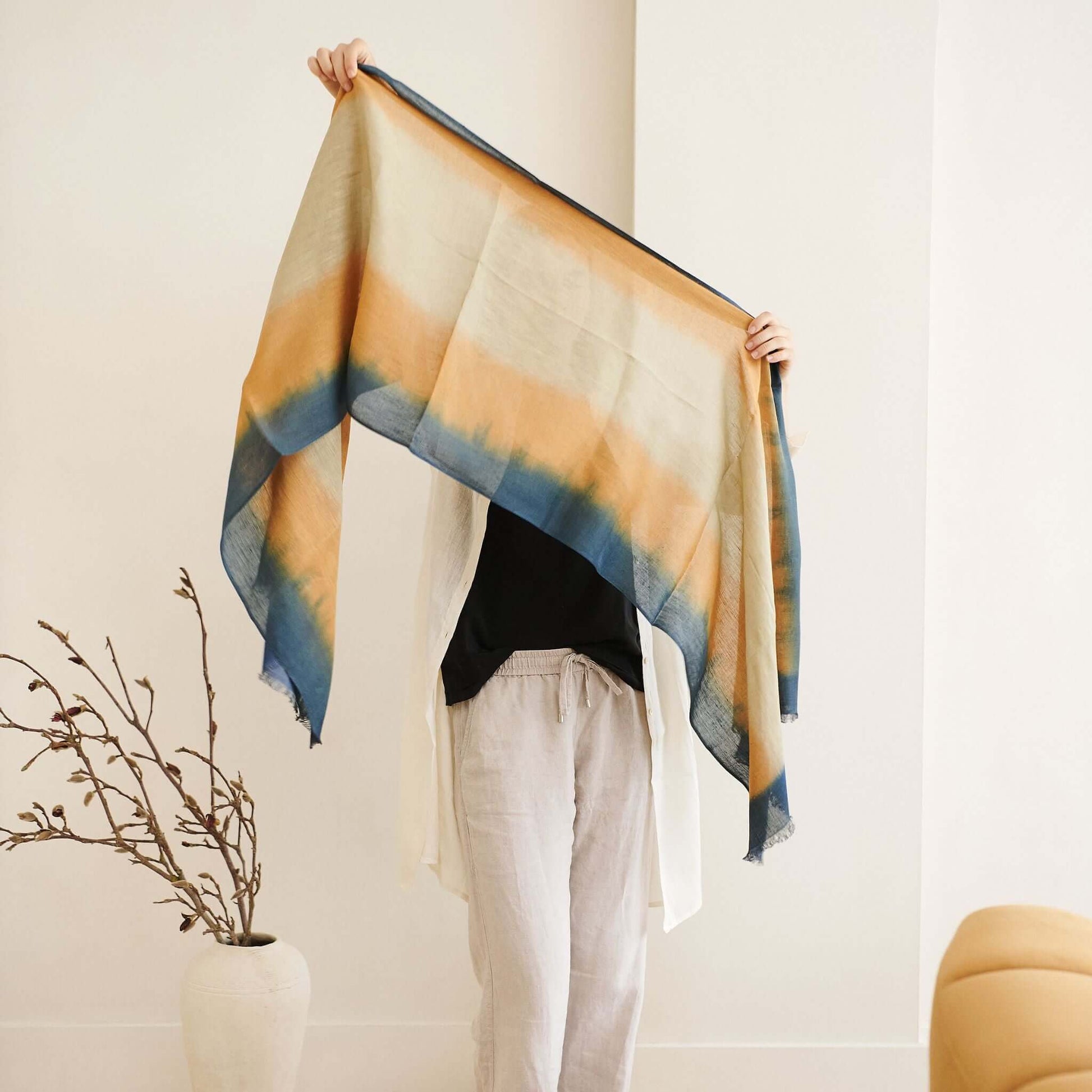 Oceana Beige Soft Linen Silk Handloom Scarf showcased in ombre effect with warm colors and blue tones.