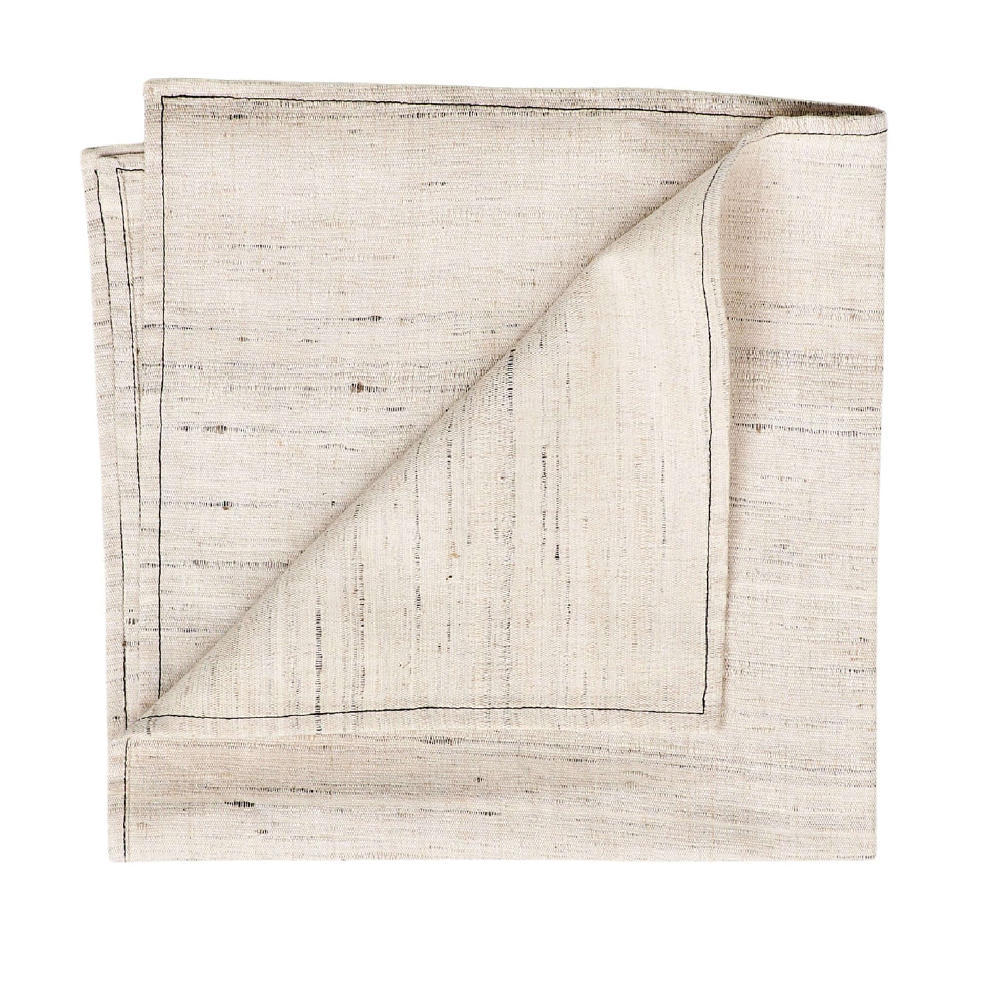 Kora Off White Peace Silk Handloom Napkin set of 4 folded with gently textured undyed fabric.