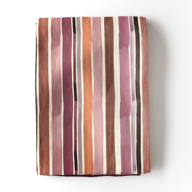 Lisbon Stripe linen tablecloth styled on round dining table - Goldie Home