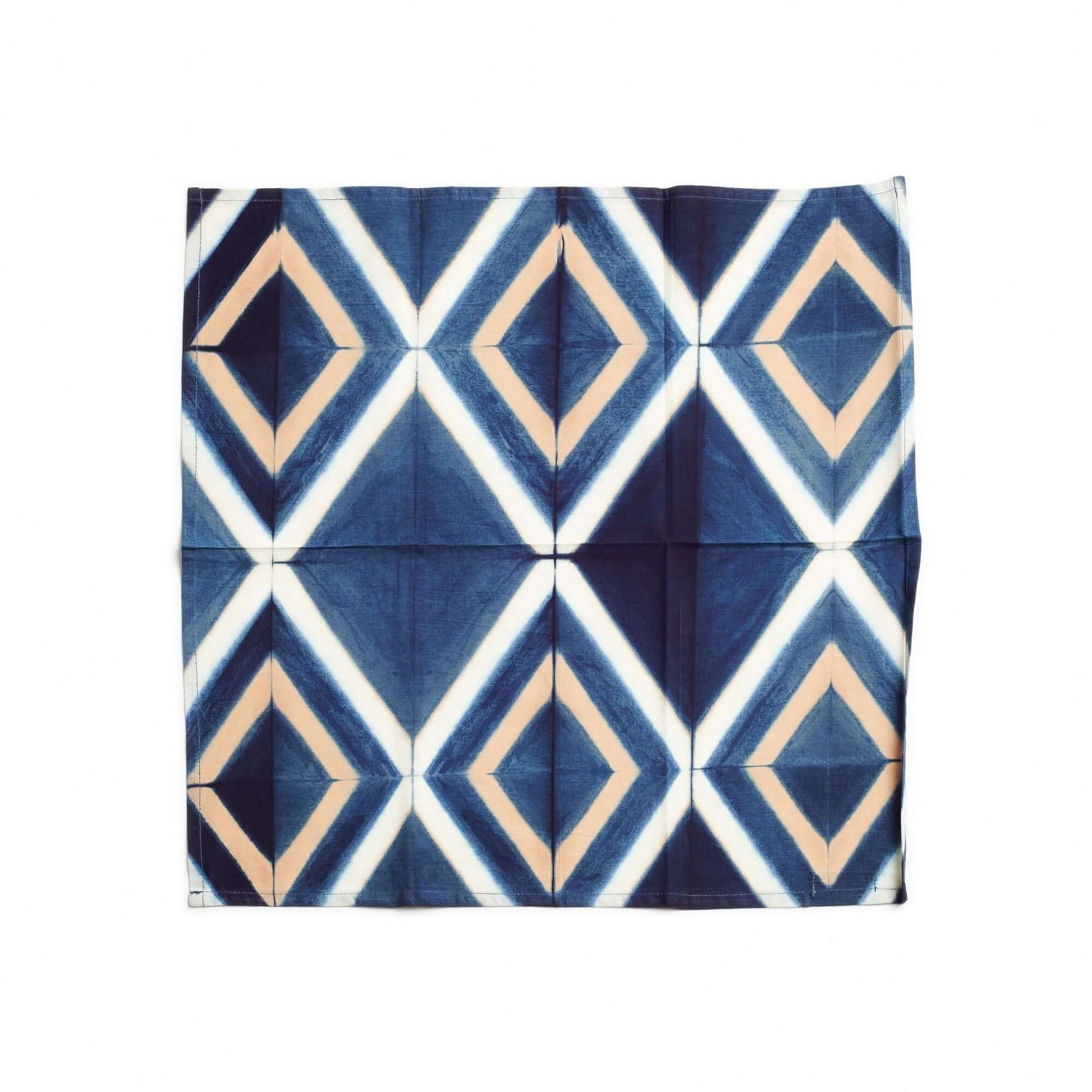 Tisa Indigo Hand Crafted Shibori Print Cotton Table Napkin set of 4 with geometric pattern in blue and beige.