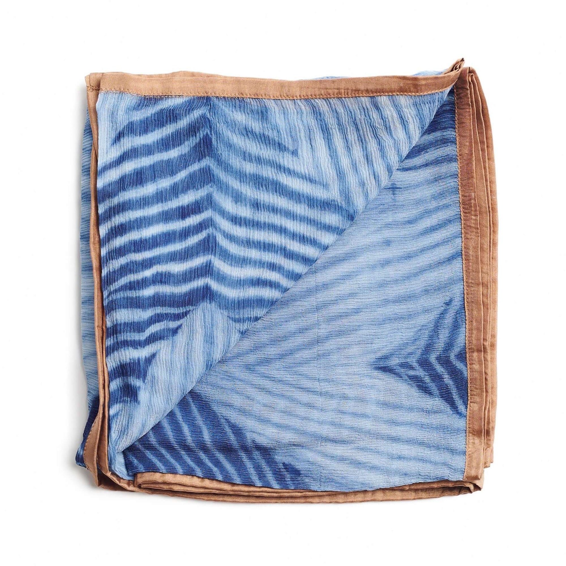 Chiffon square scarf in blue and brown, featuring unique shibori print design, perfect for any occasion.